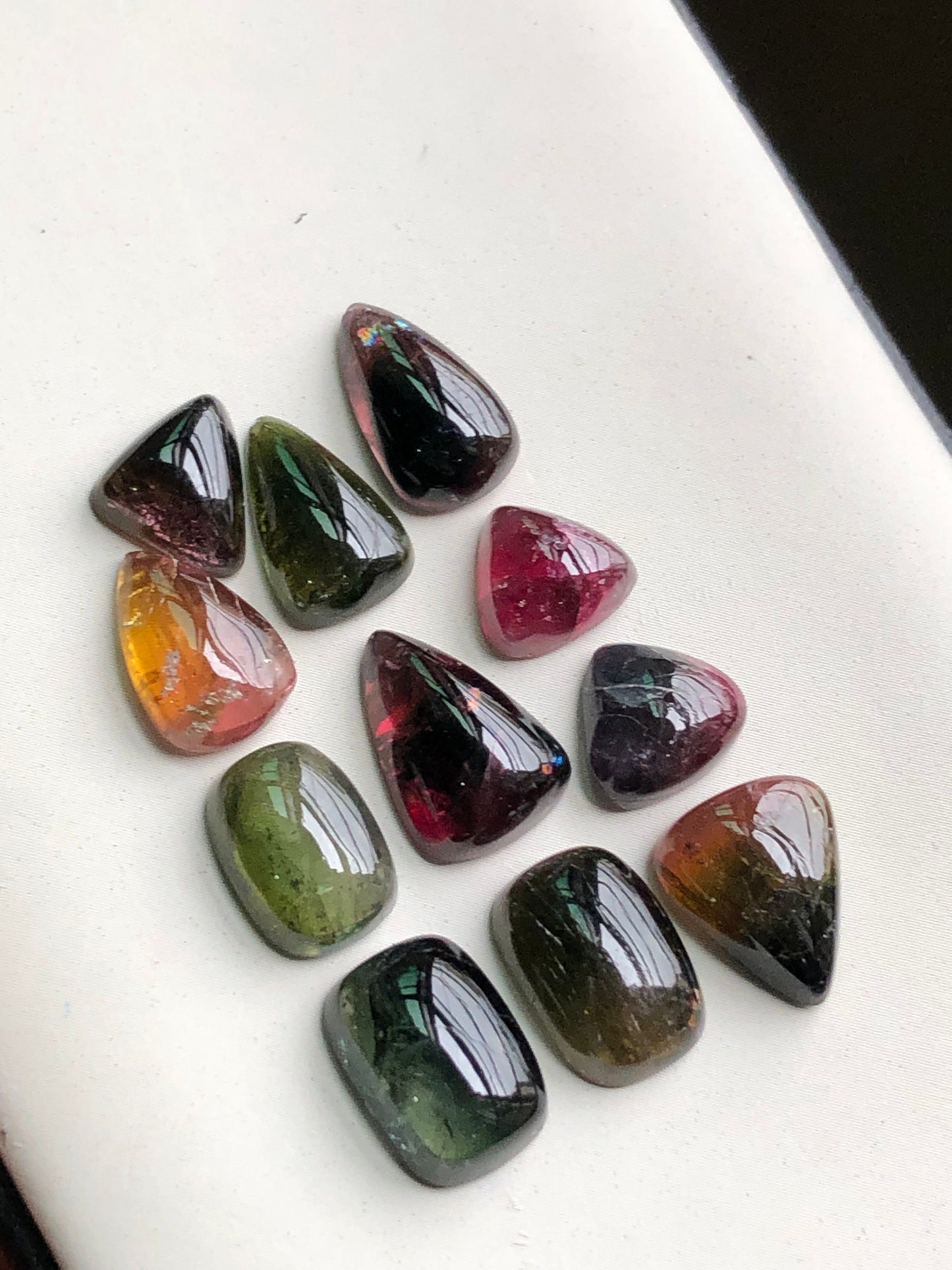 Bi colour tourmaline cabochons lot 34 carats