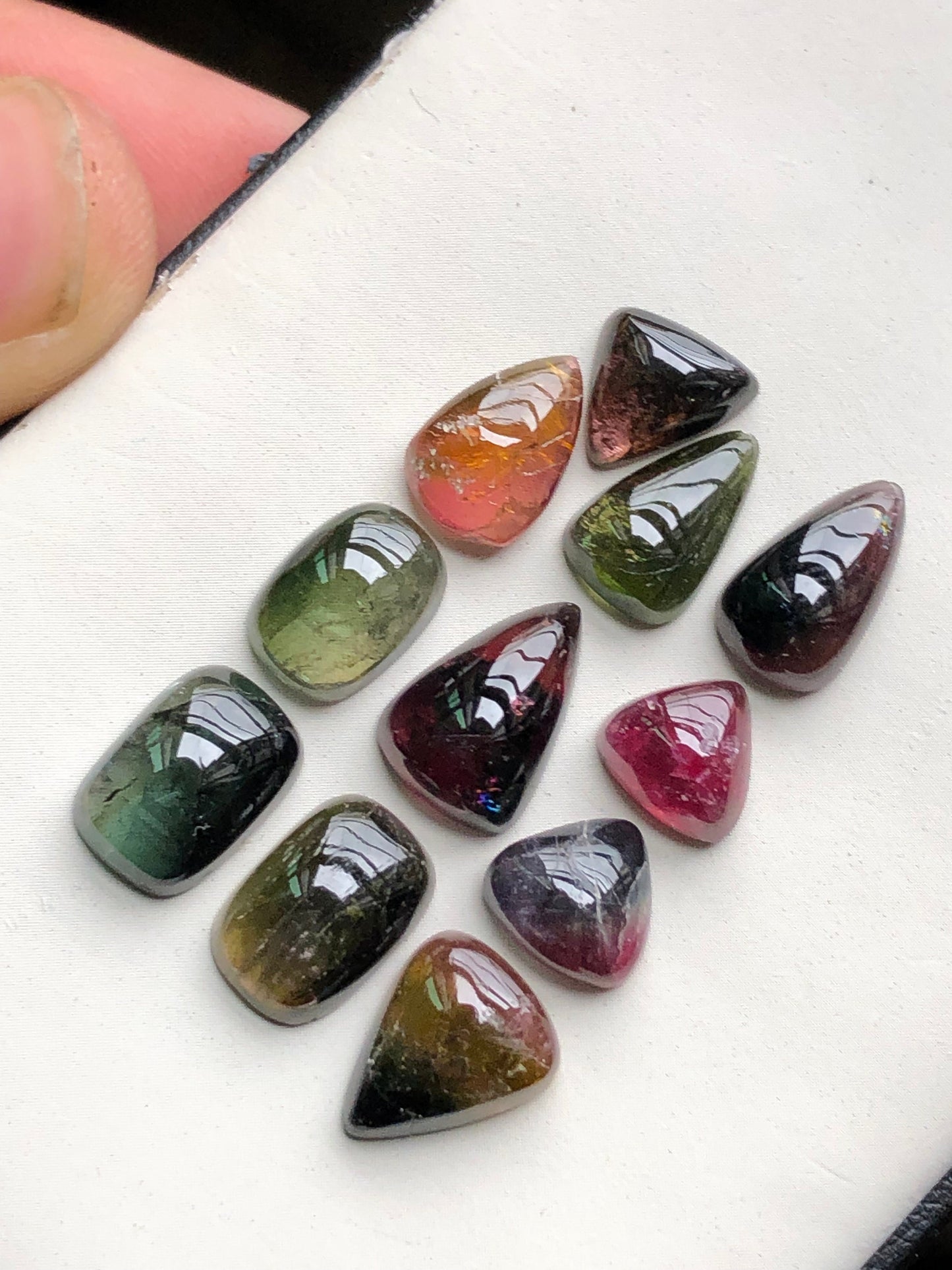 Bi colour tourmaline cabochons lot 34 carats