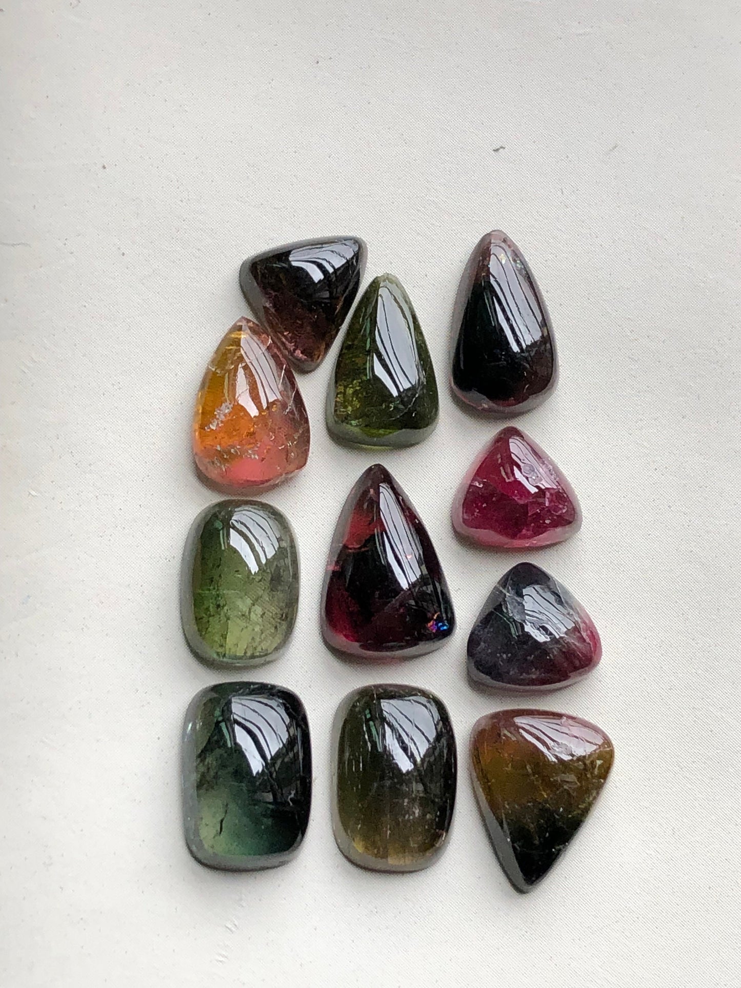 Bi colour tourmaline cabochons lot 34 carats