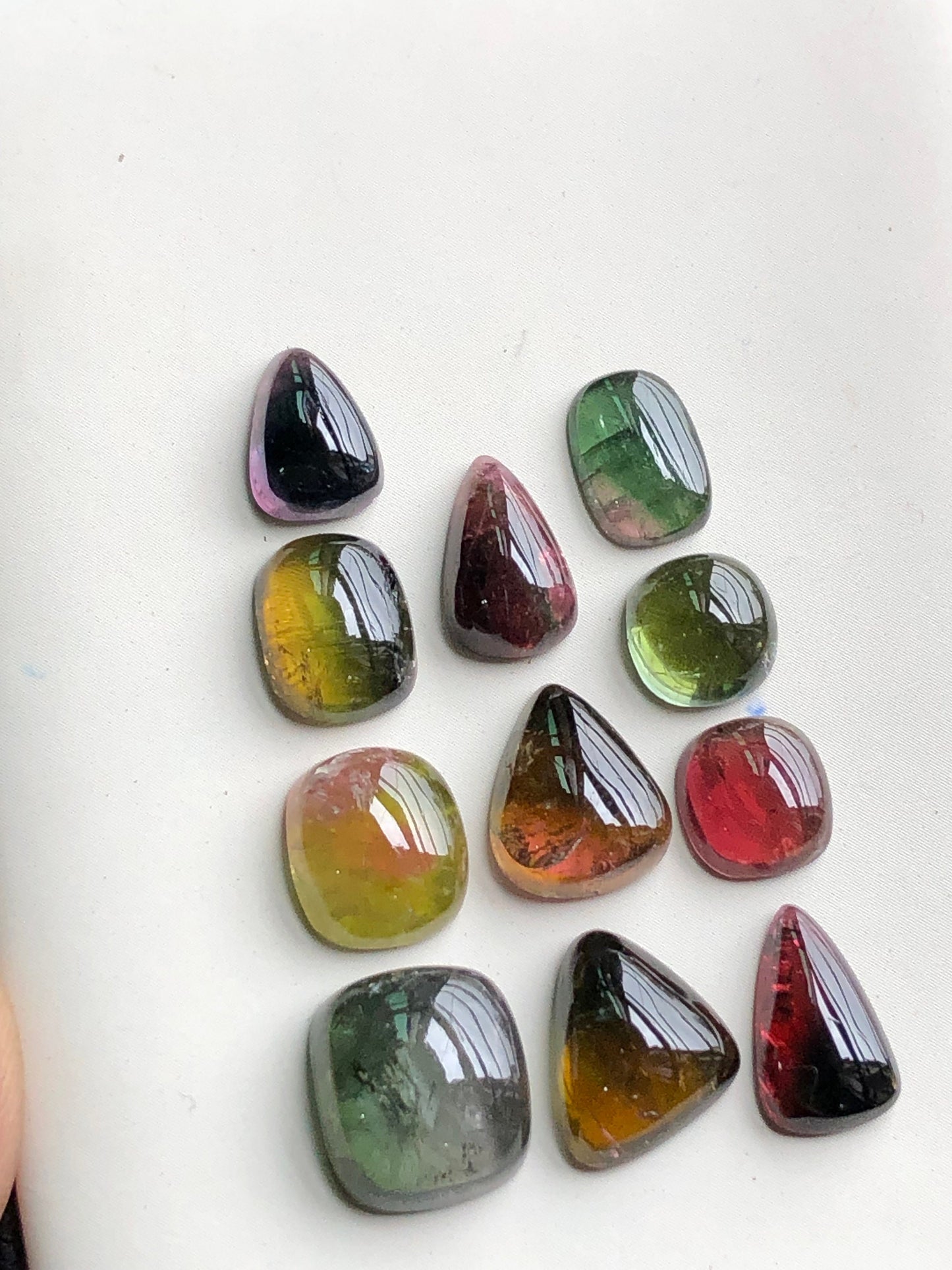 Bi colour tourmaline cabochons lot 30 carats