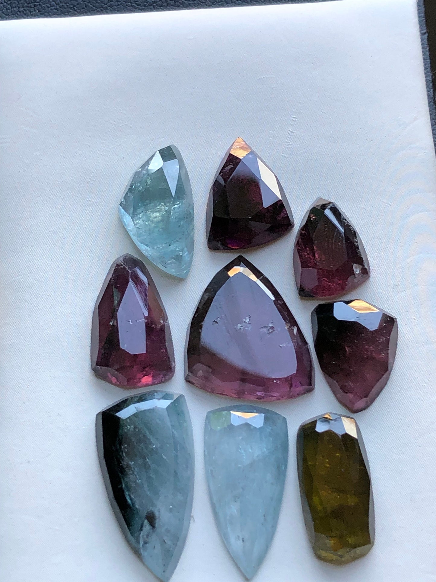 Blue and rubylight tourmaline rose cuts 64 carats