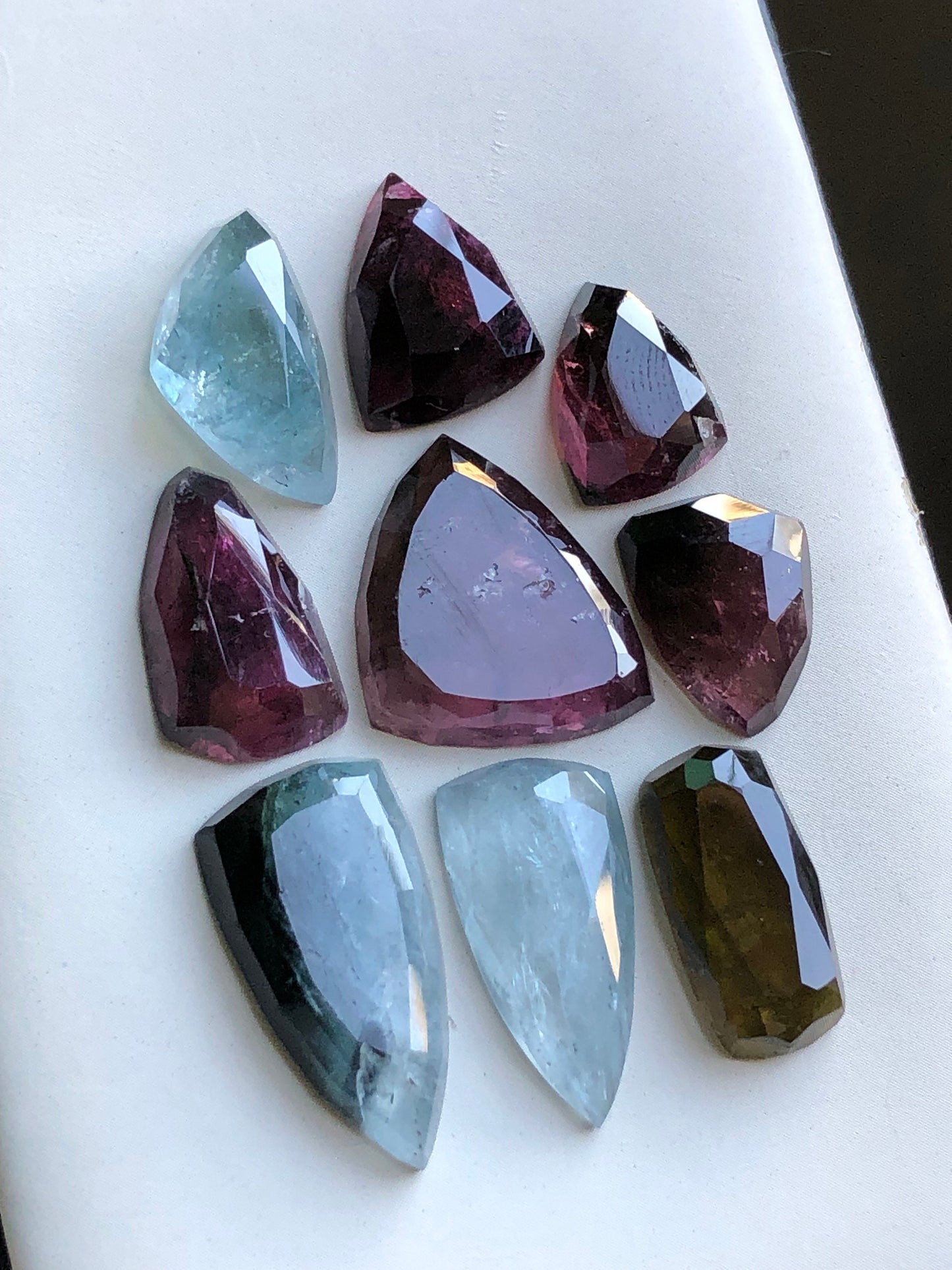 Blue and rubylight tourmaline rose cuts 64 carats