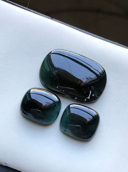 Dark blue tourmaline cabochons 37.70 carats