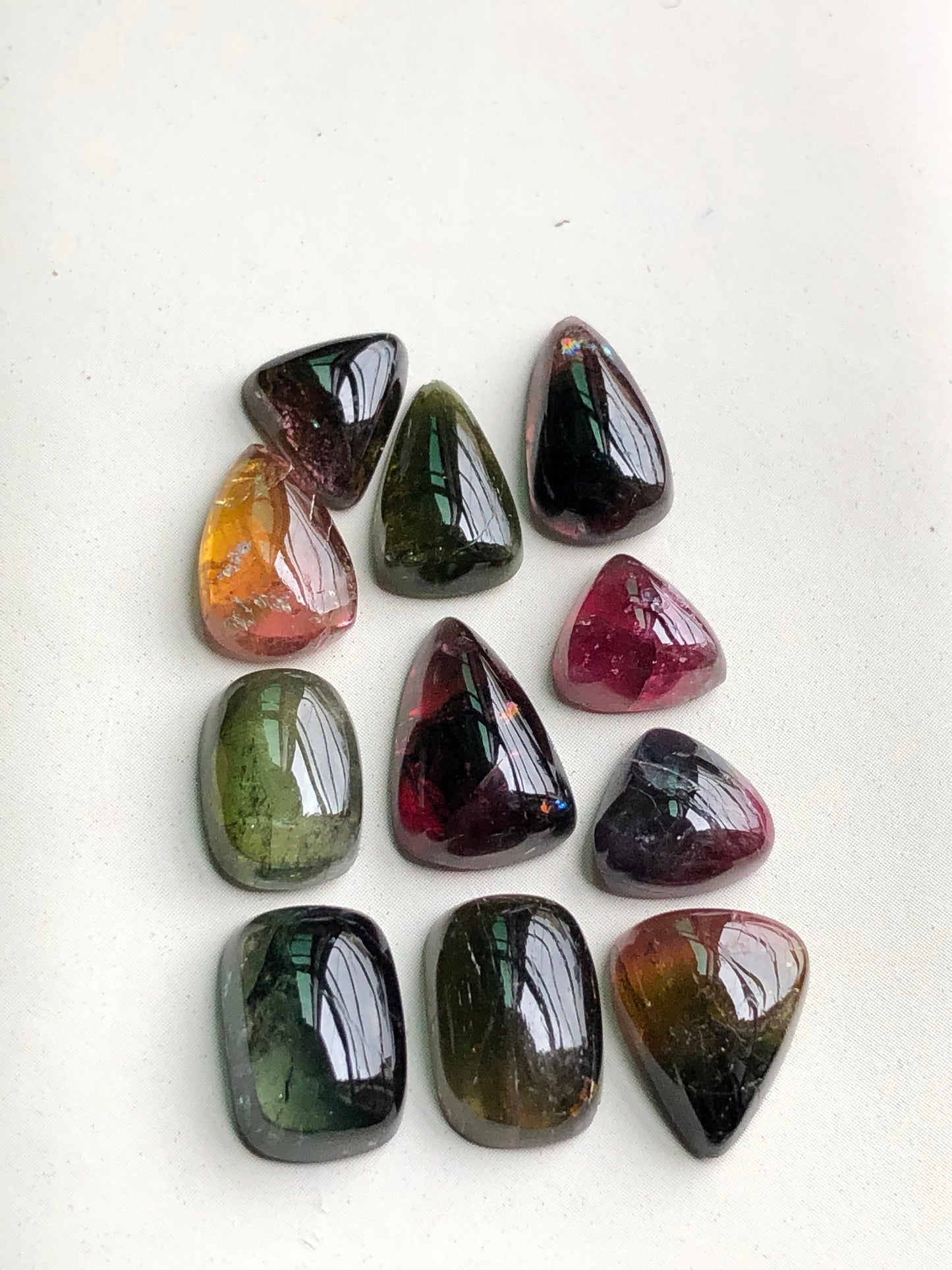 Bi colour tourmaline cabochons lot 34 carats