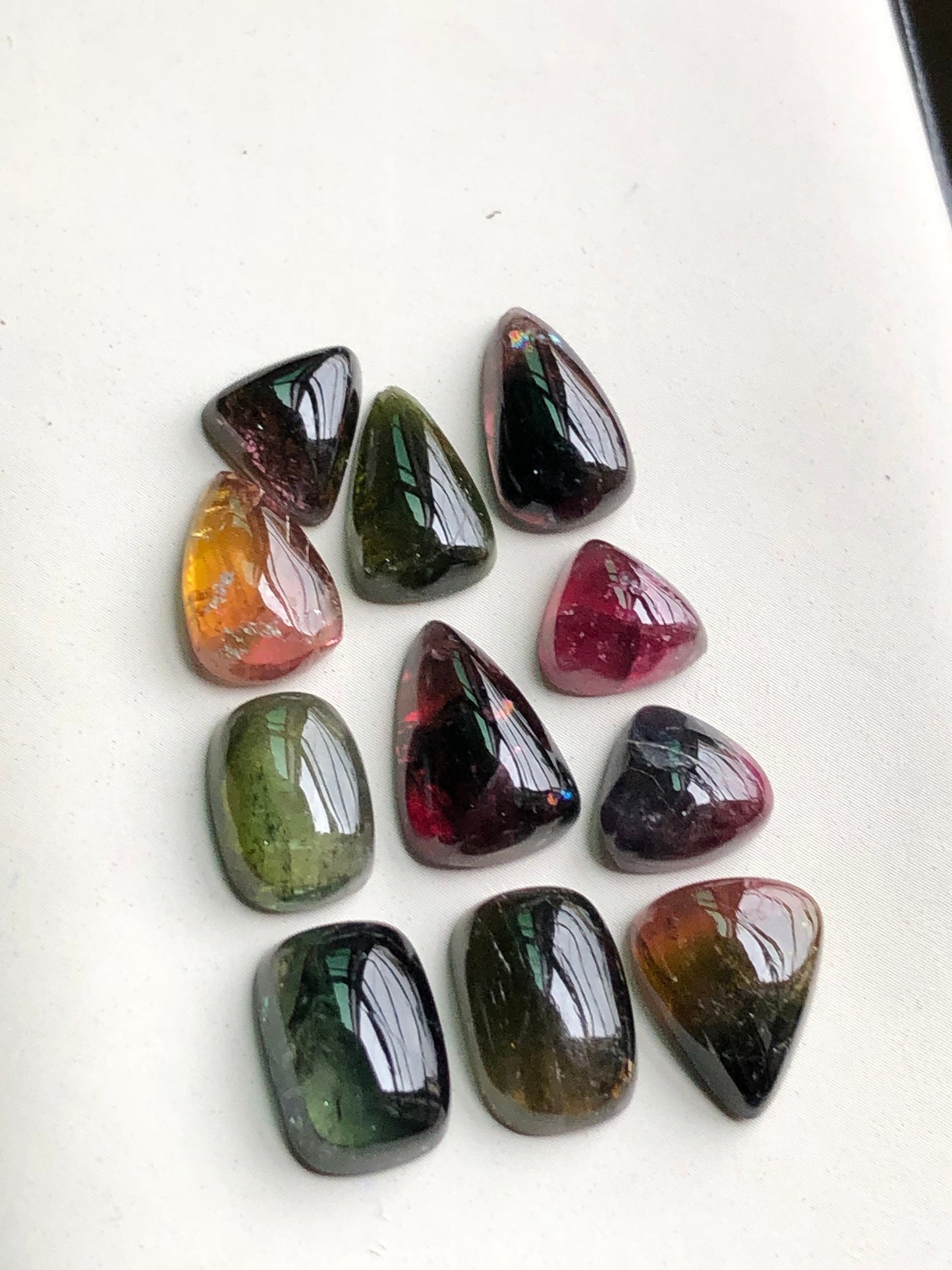 Bi colour tourmaline cabochons lot 34 carats