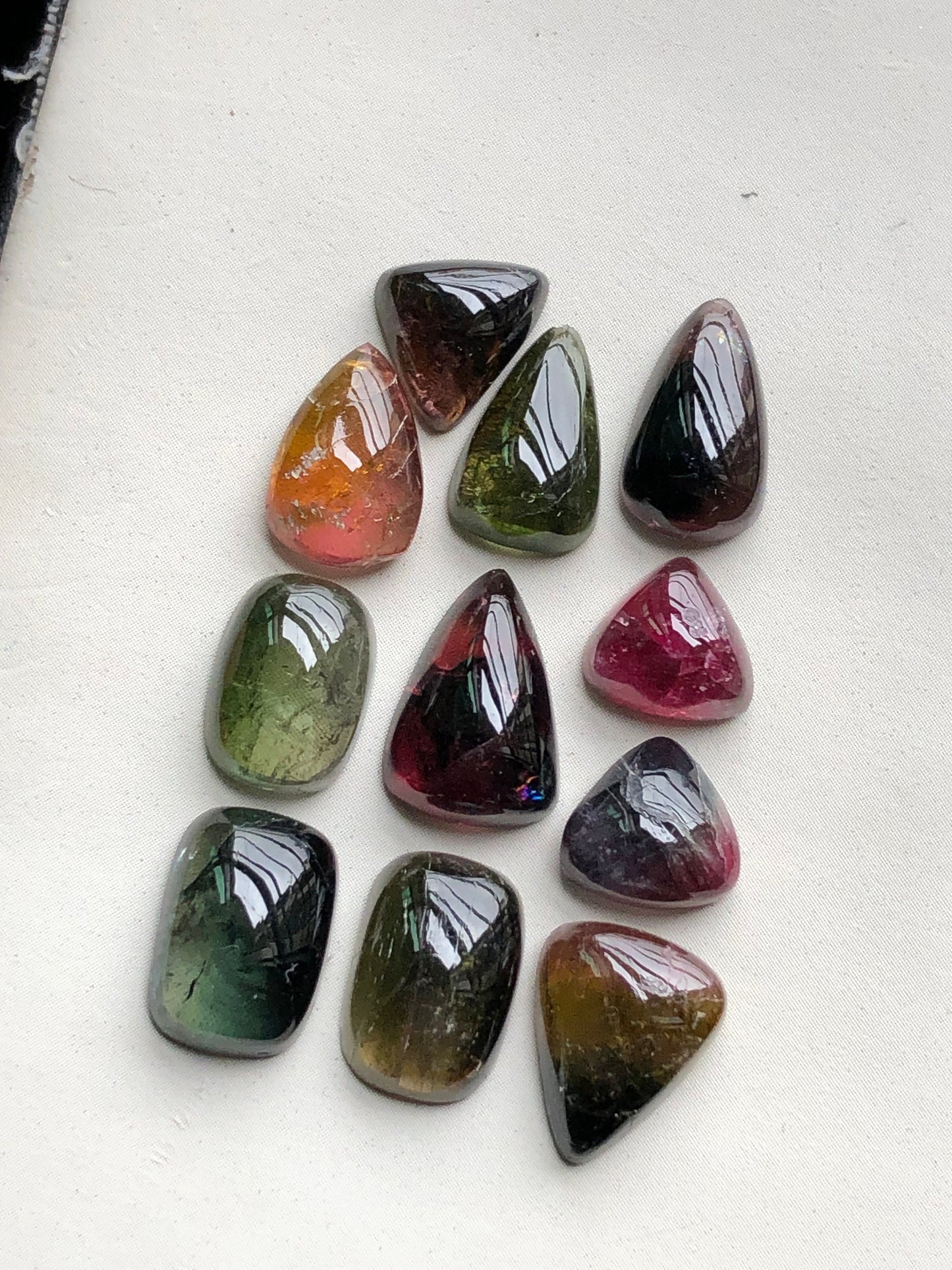 Bi colour tourmaline cabochons lot 34 carats