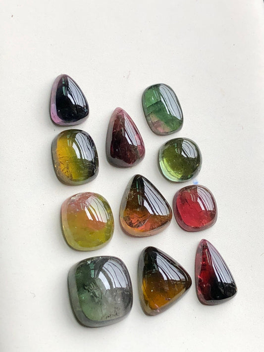 Bi colour tourmaline cabochons lot 30 carats