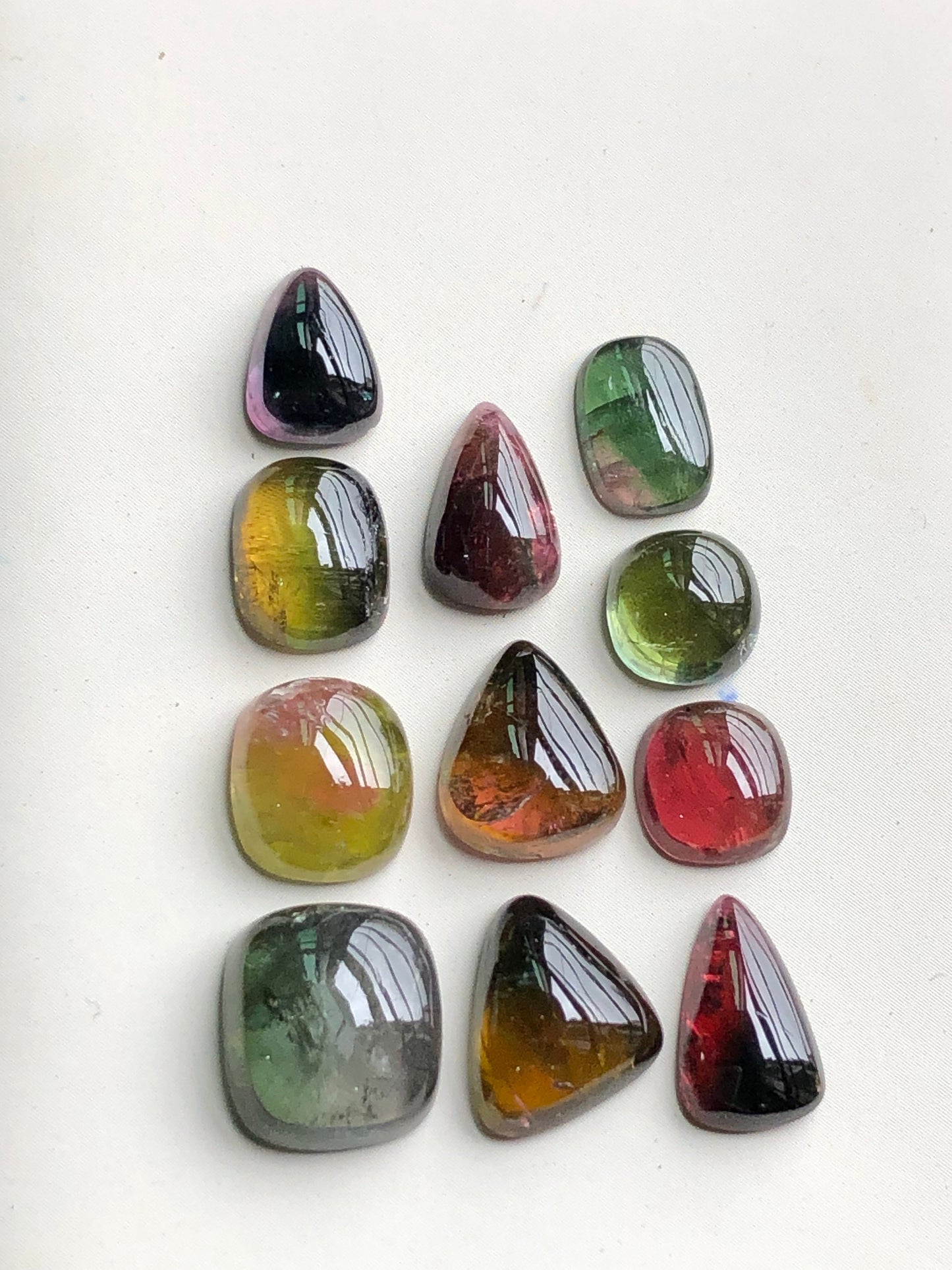 Bi colour tourmaline cabochons lot 30 carats