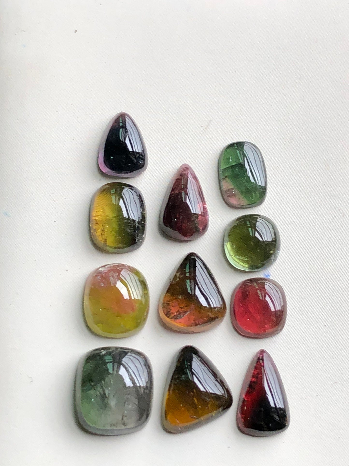 Bi colour tourmaline cabochons lot 30 carats