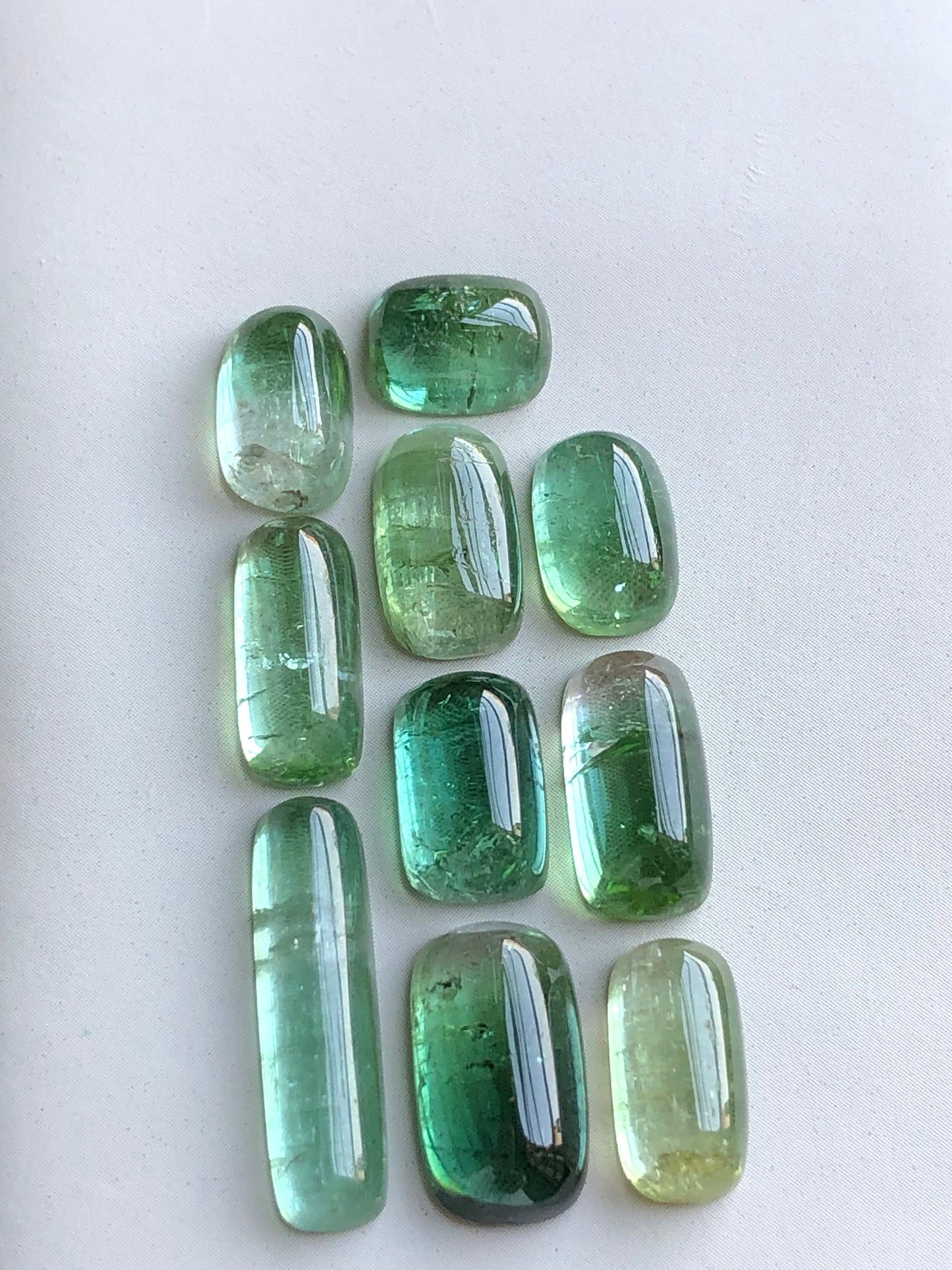 Bluish green tourmaline cabochons lot 36 carats