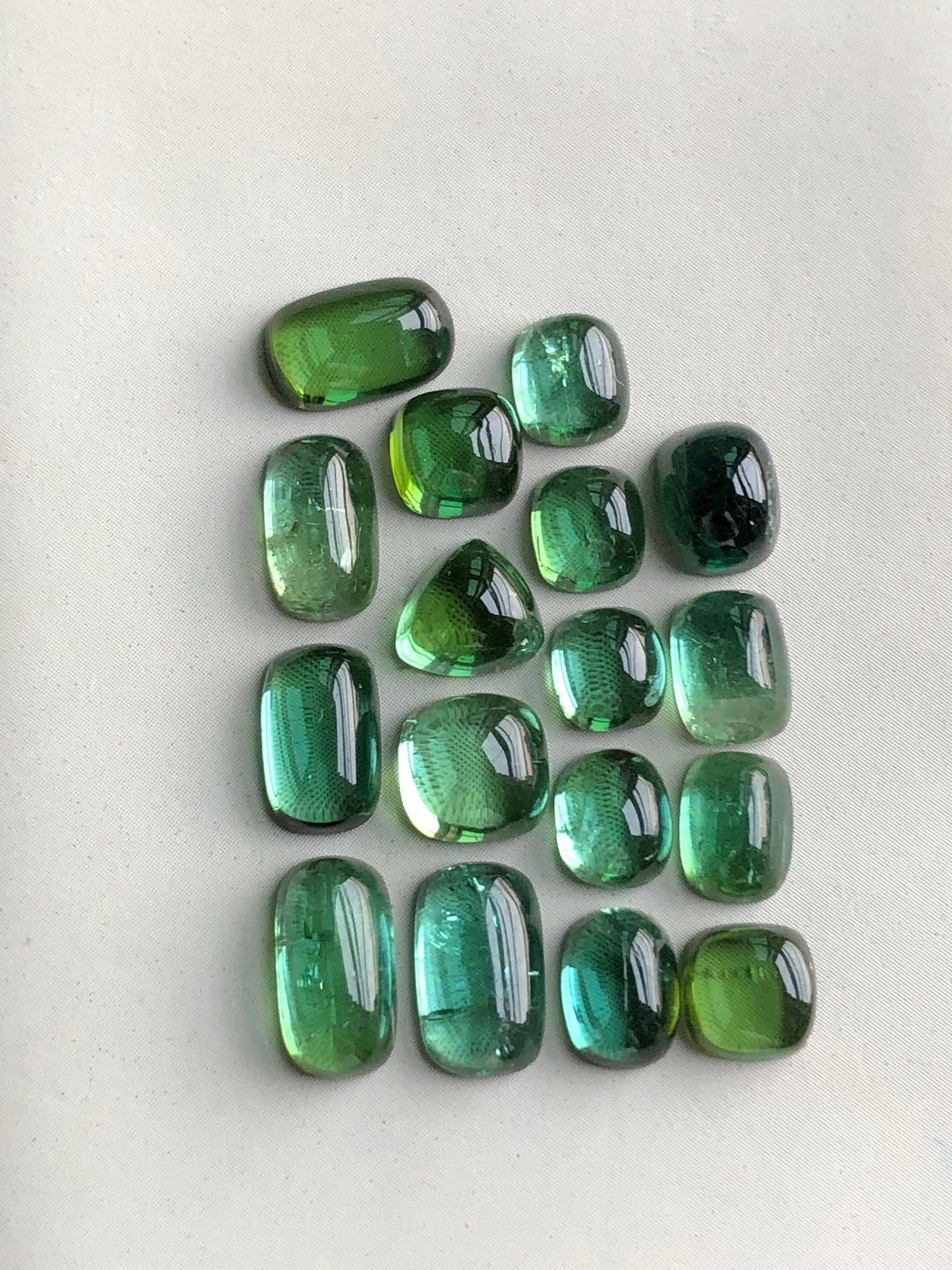 Natural bluish green tourmaline cabochons lot 21.40 carats