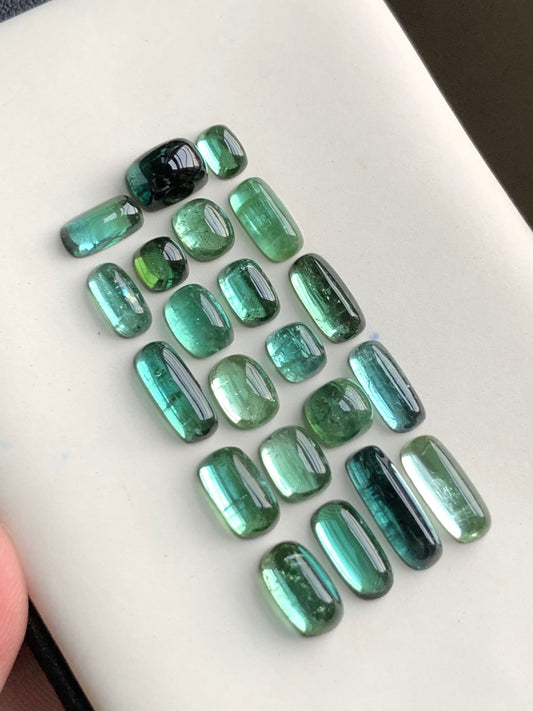 Natural bluish green tourmaline cabochons lot 23.70 carats