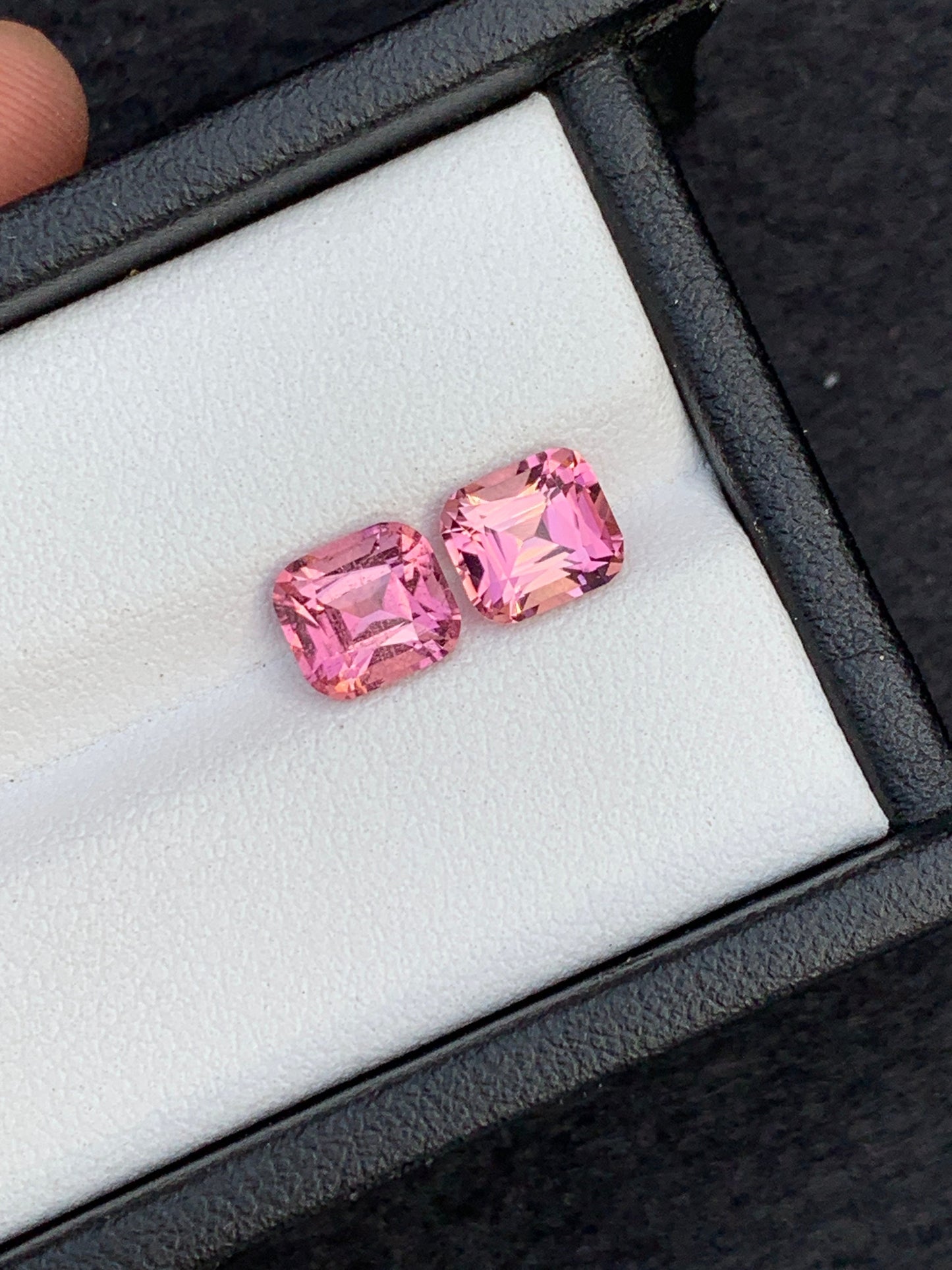 Vivid pink tourmalines almost a pair 2.65 carats