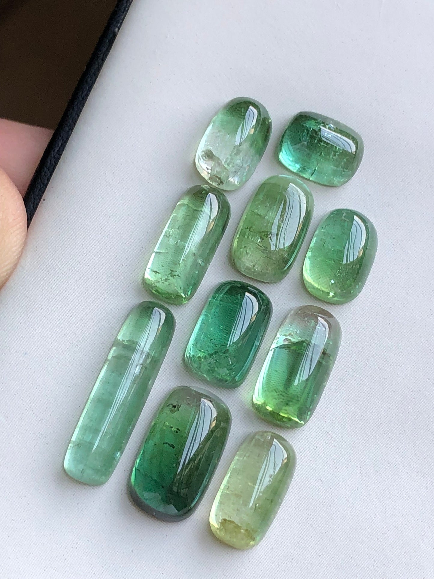 Bluish green tourmaline cabochons lot 36 carats