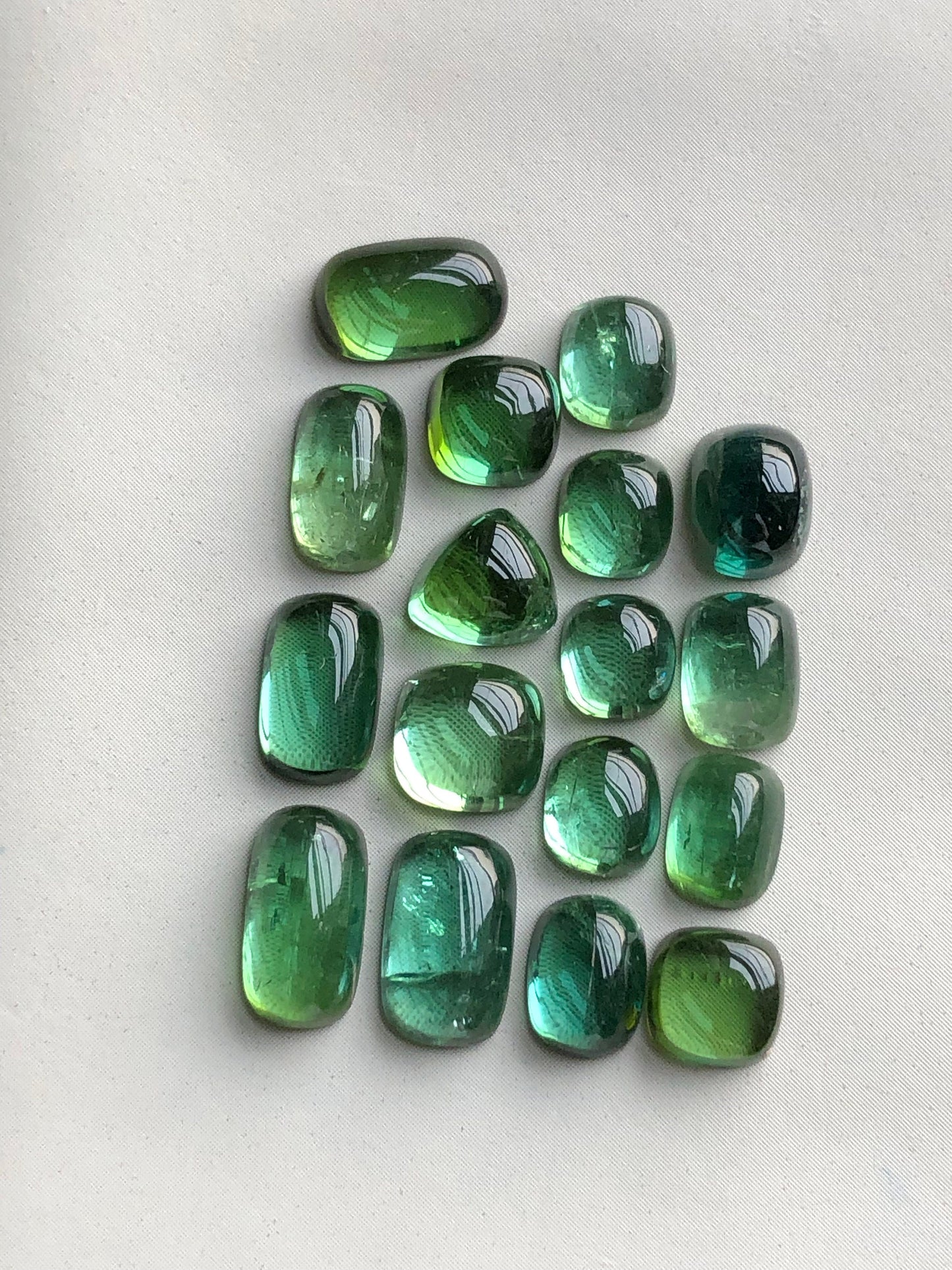 Natural bluish green tourmaline cabochons lot 21.40 carats