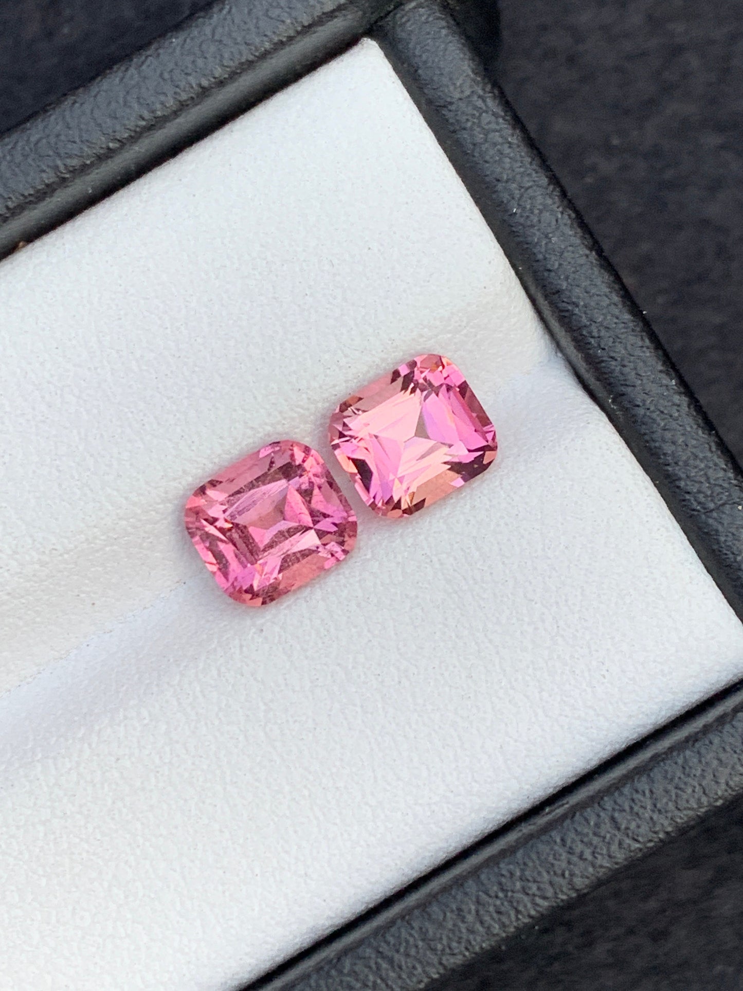 Vivid pink tourmalines almost a pair 2.65 carats