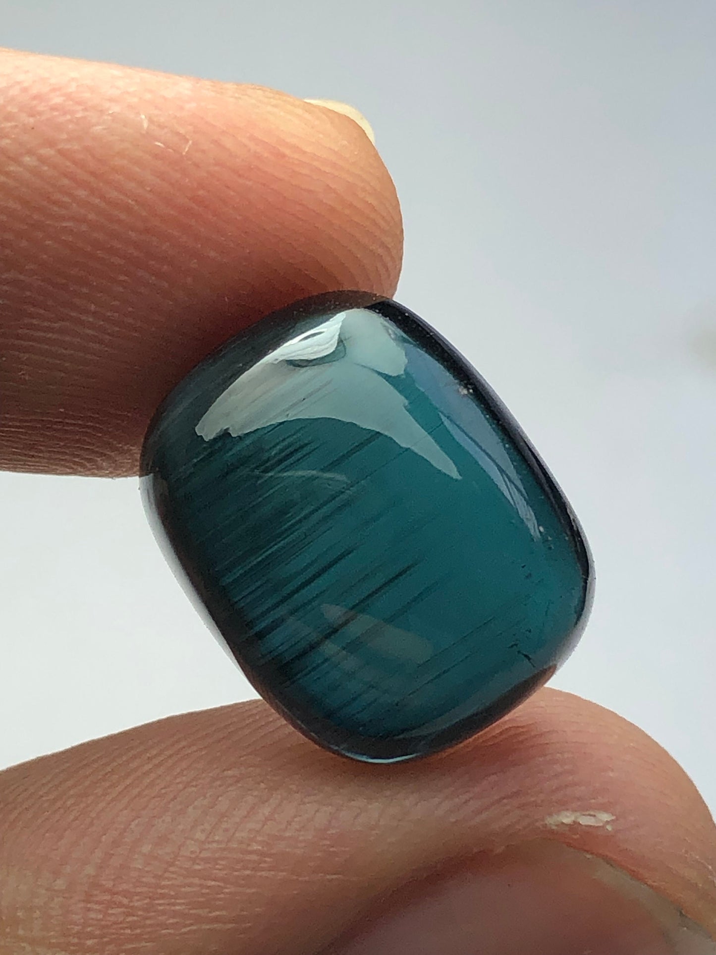 Dark blue tourmaline cabochon 10 carat