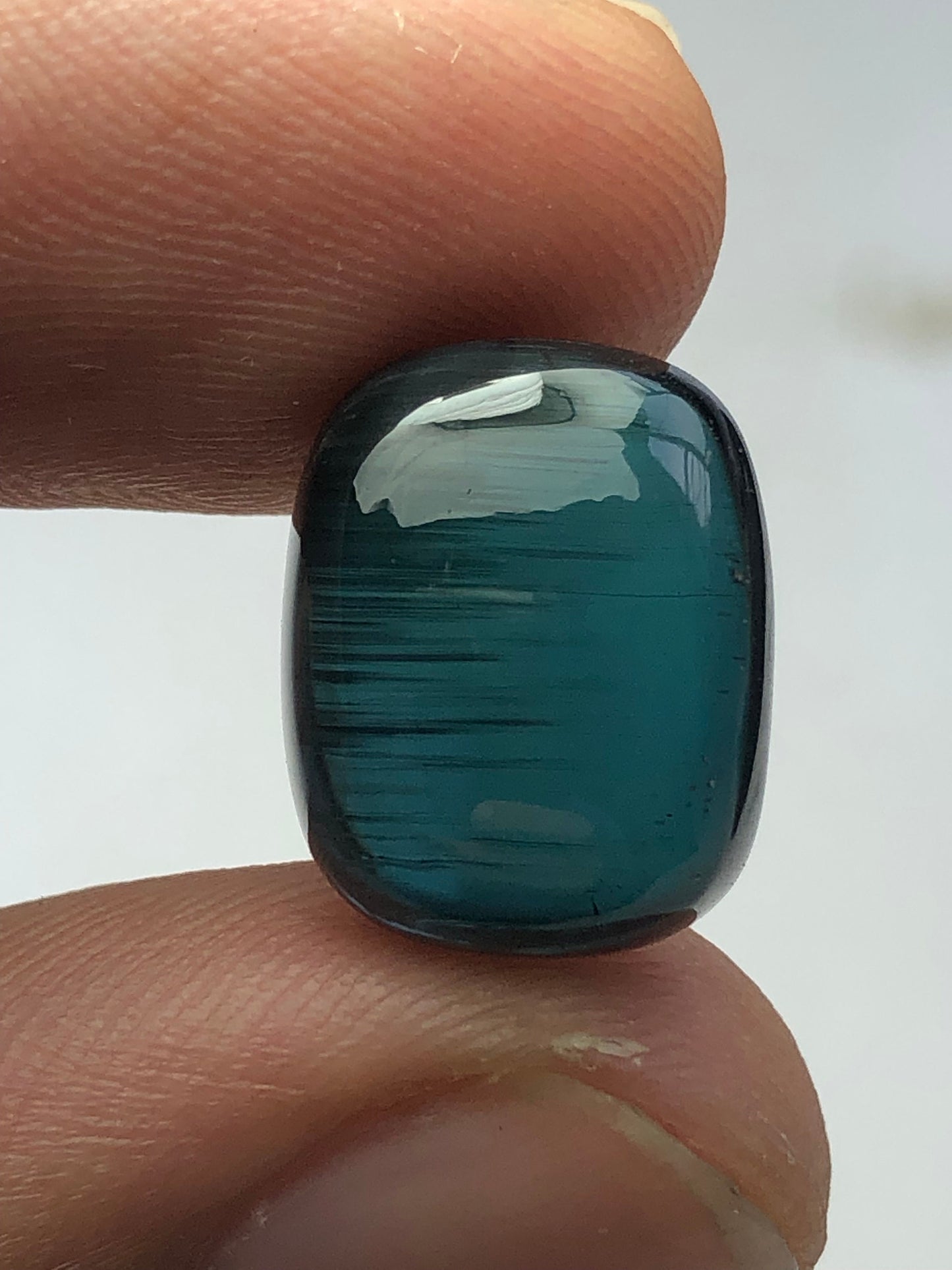 Dark blue tourmaline cabochon 10 carat