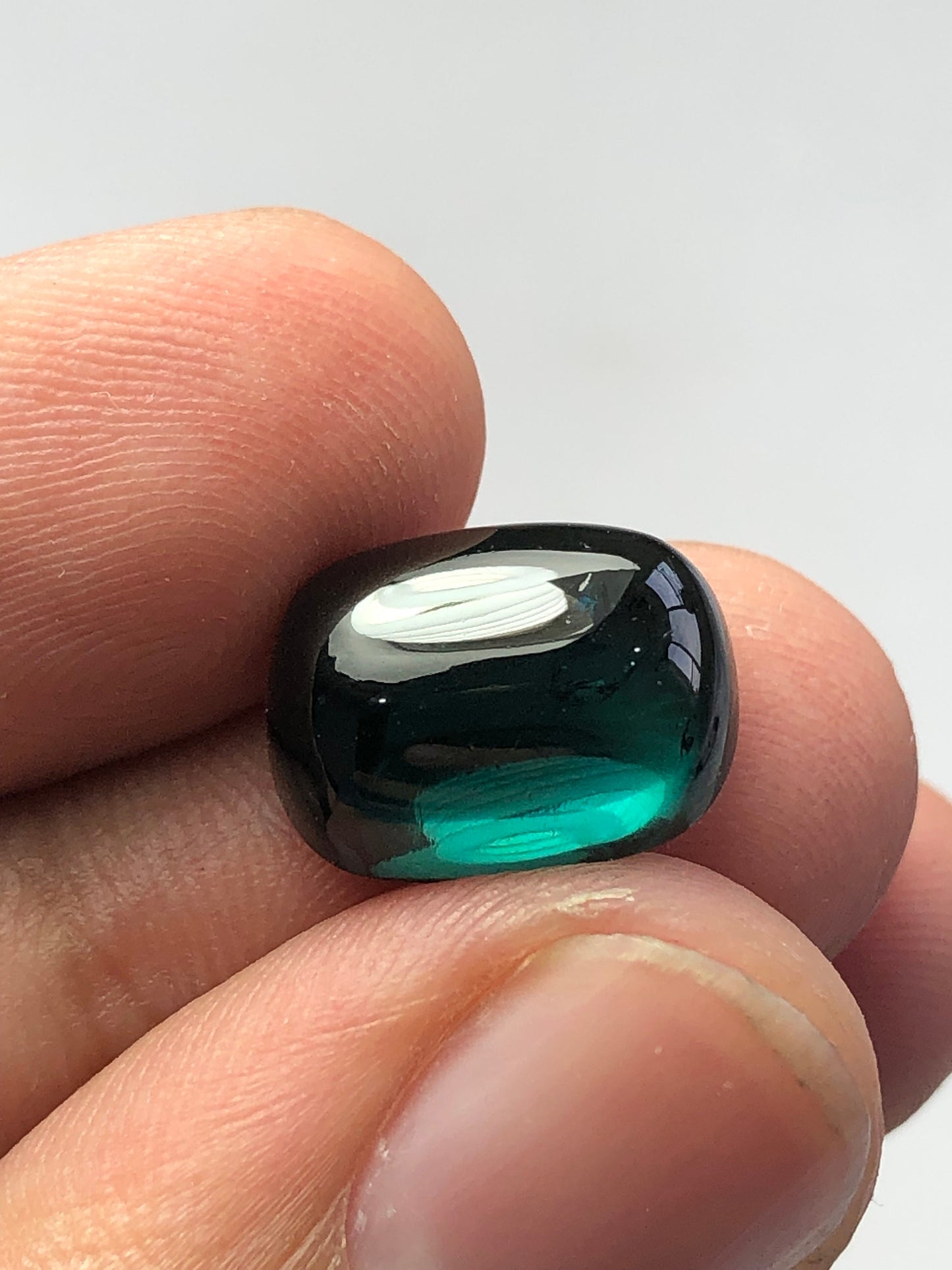 Dark blue tourmaline cabochon 8 carat