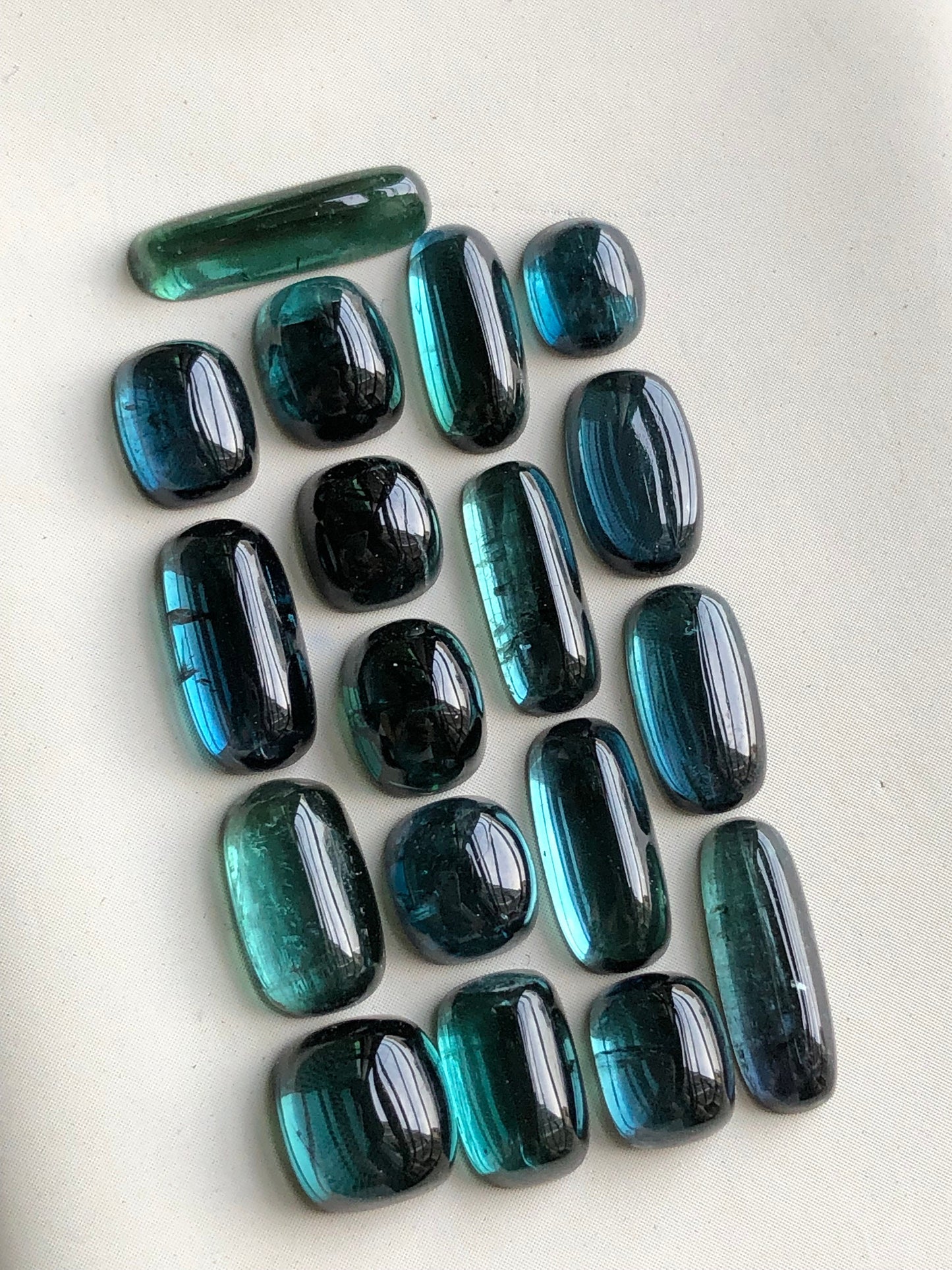 31 carats blue tourmaline cabochons origin Afghanistan 6mm to 13.5mm long