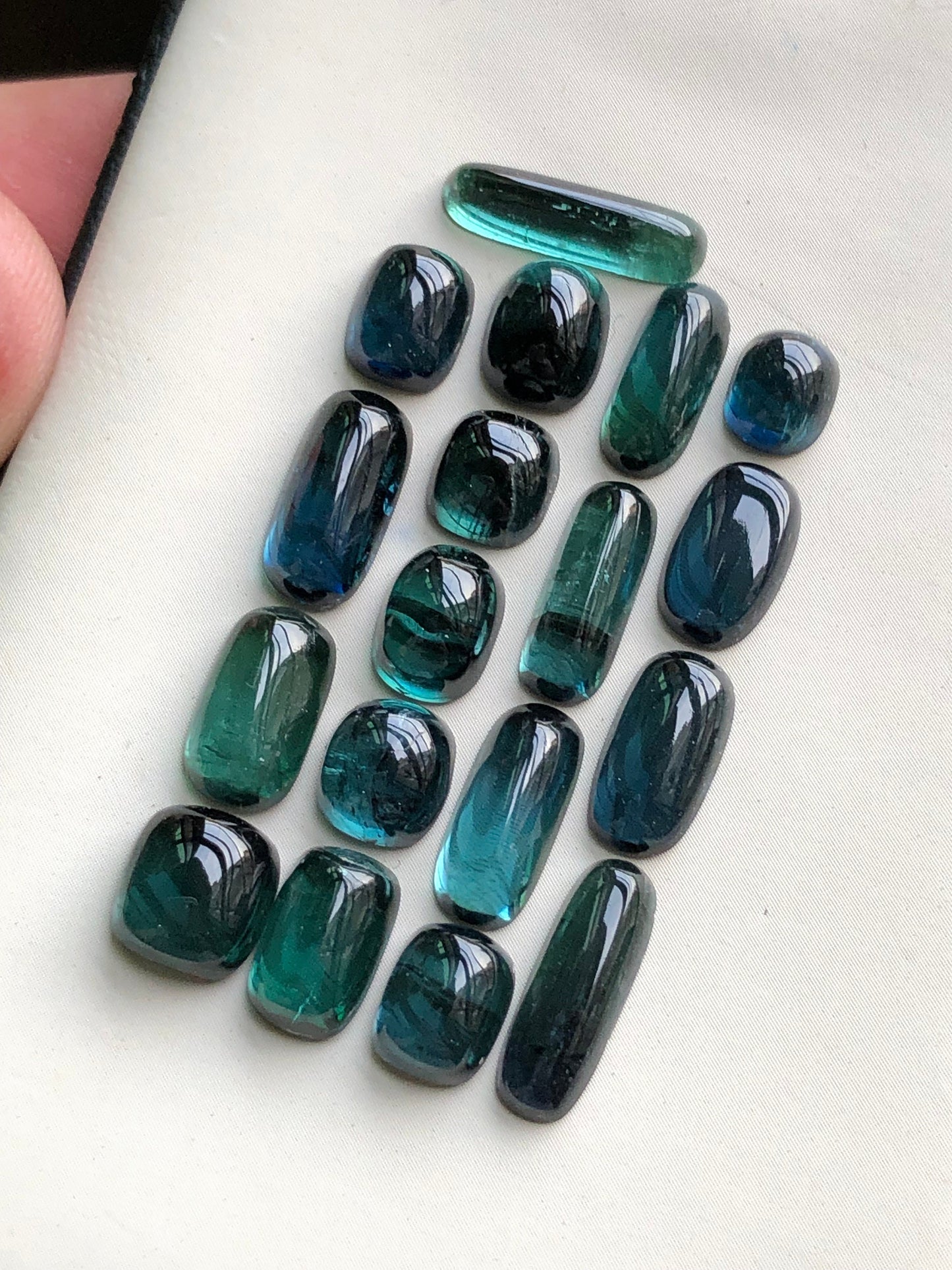 31 carats blue tourmaline cabochons origin Afghanistan 6mm to 13.5mm long