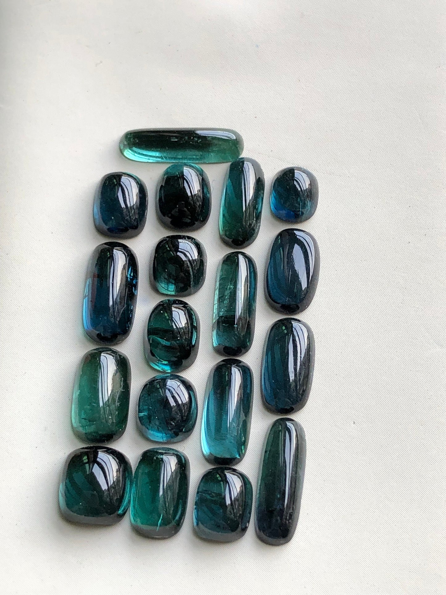 31 carats blue tourmaline cabochons origin Afghanistan 6mm to 13.5mm long