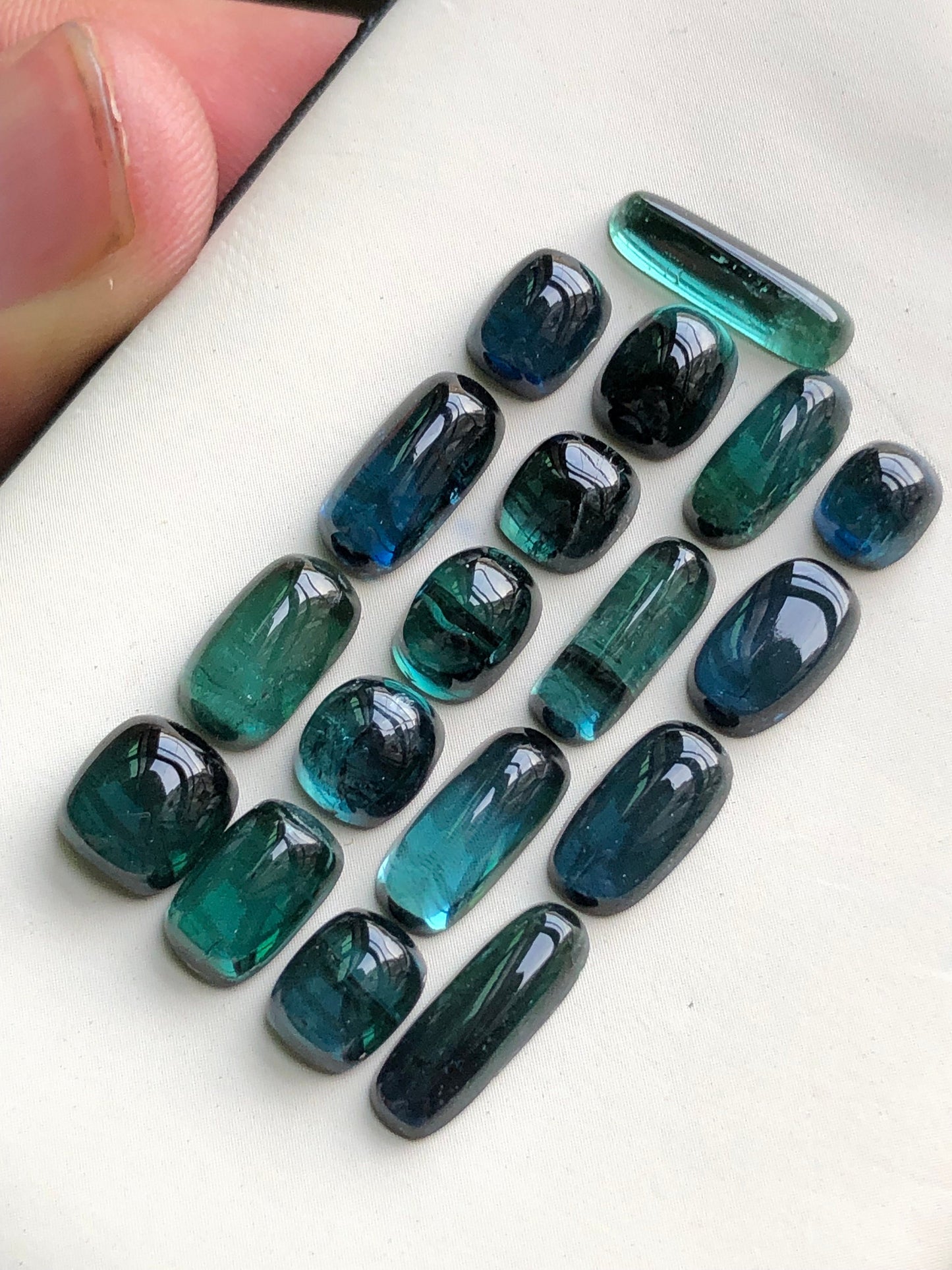 31 carats blue tourmaline cabochons origin Afghanistan 6mm to 13.5mm long