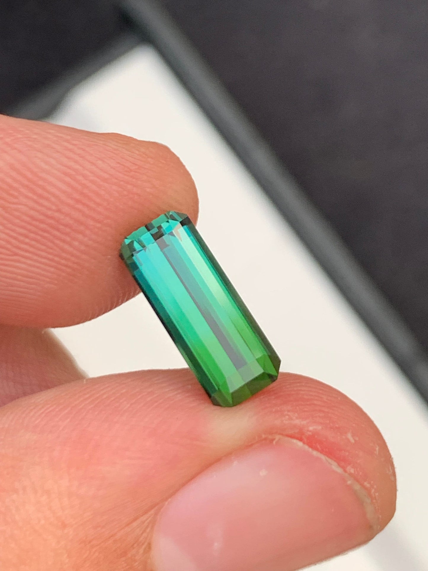 2.60 ct faceted blue green tourmaline dimension:13*5*4mm