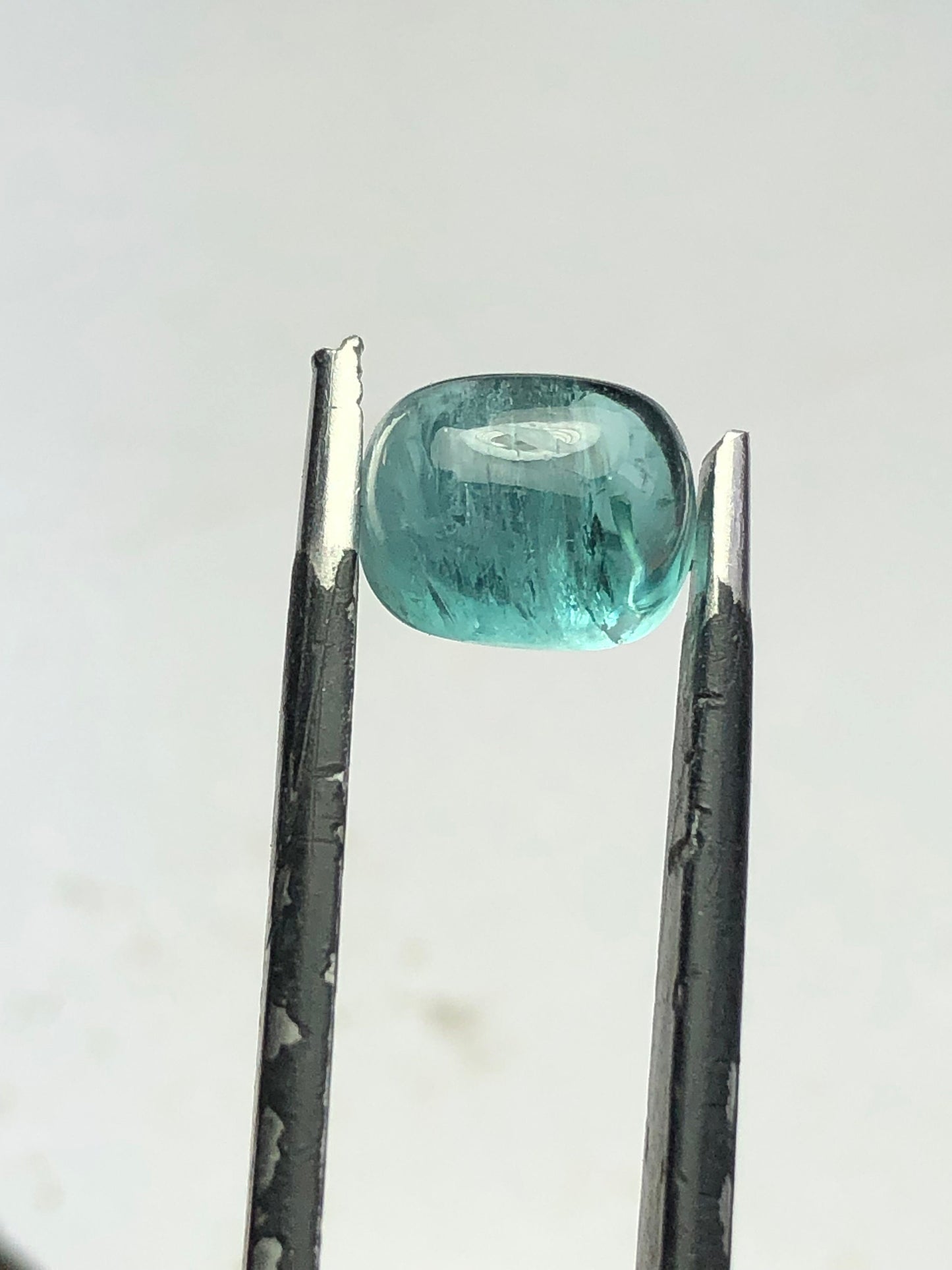 4 carat neon blue tourmaline cabochon