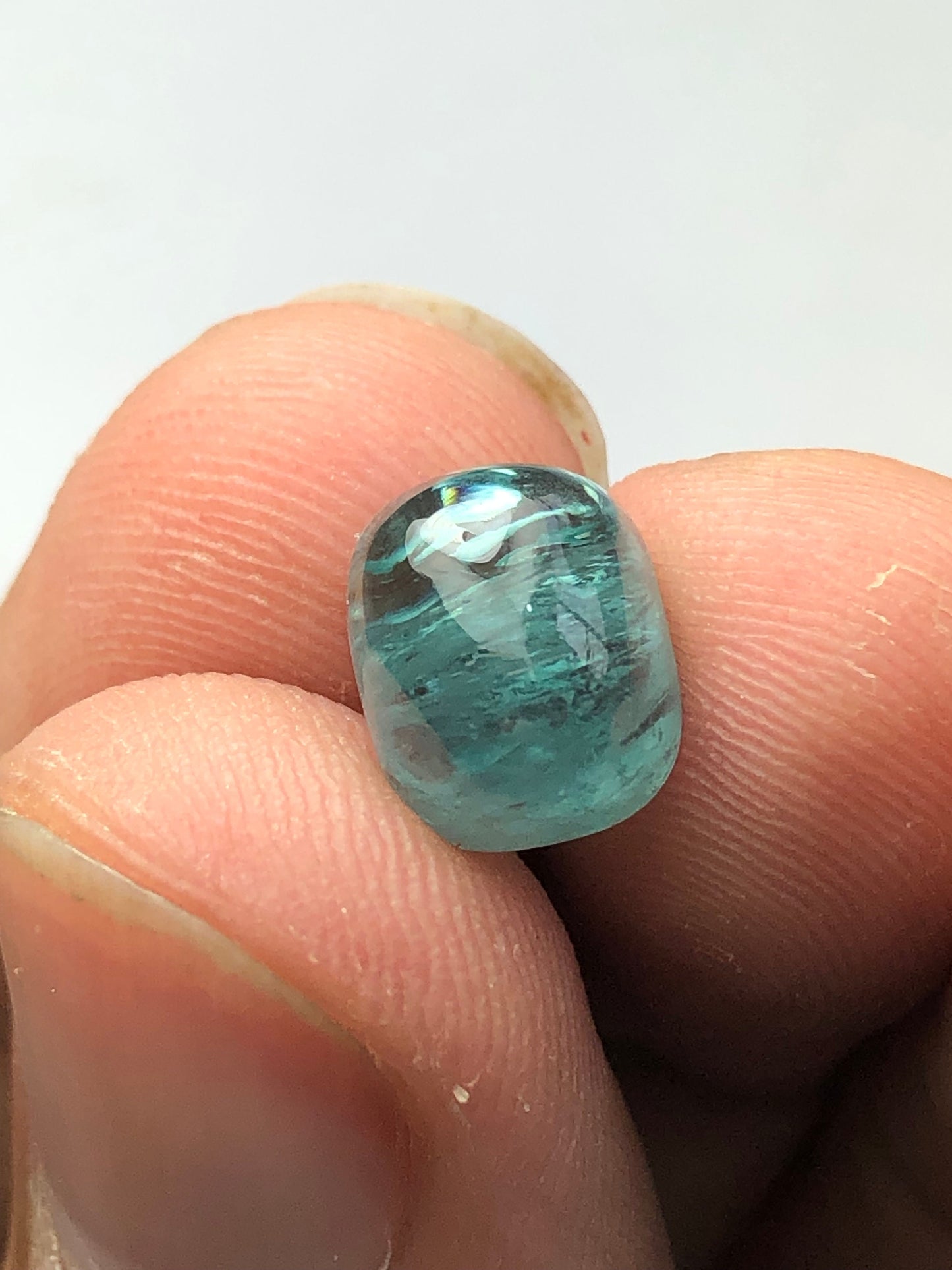 4 carat neon blue tourmaline cabochon