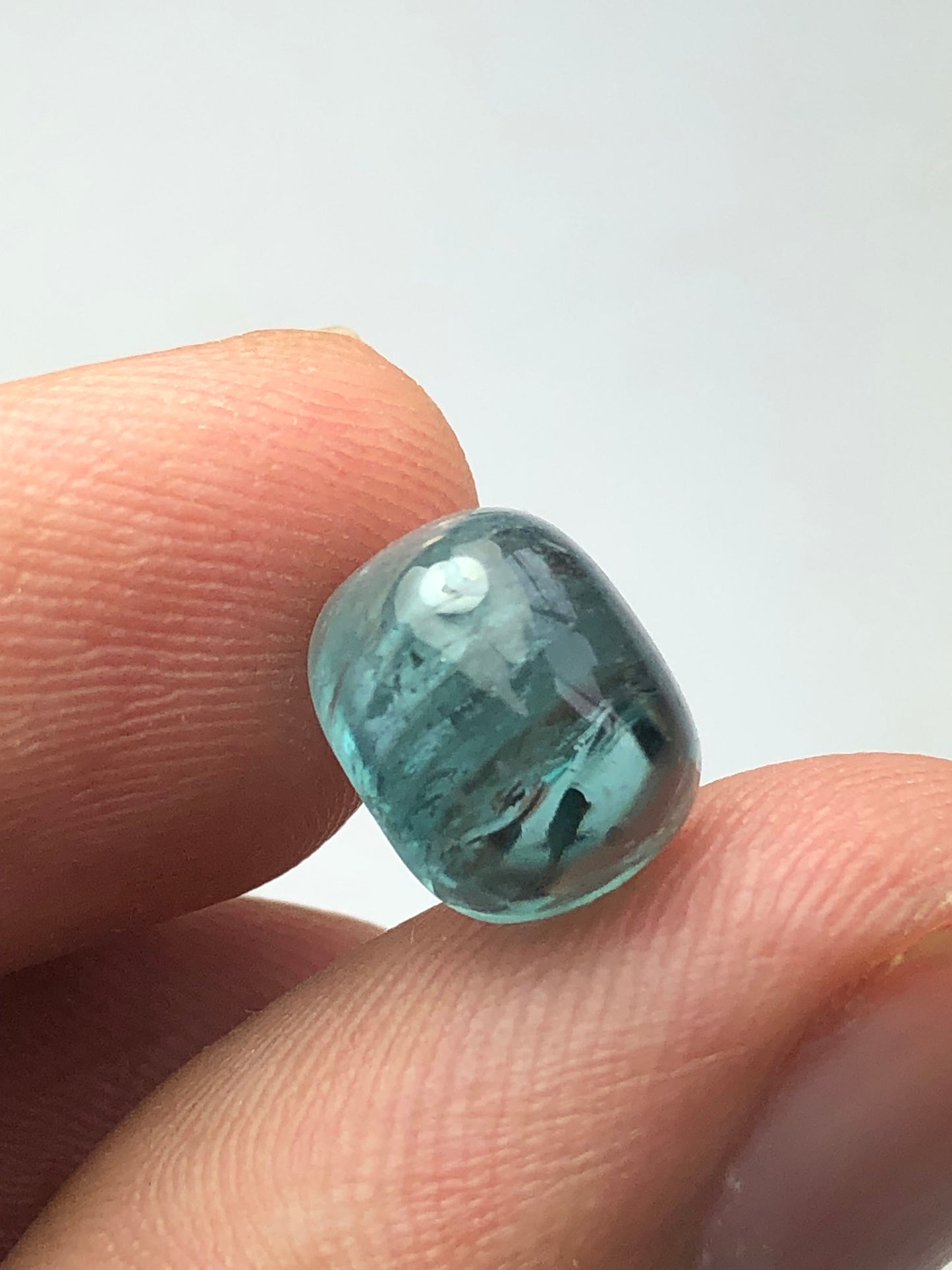 4 carat neon blue tourmaline cabochon