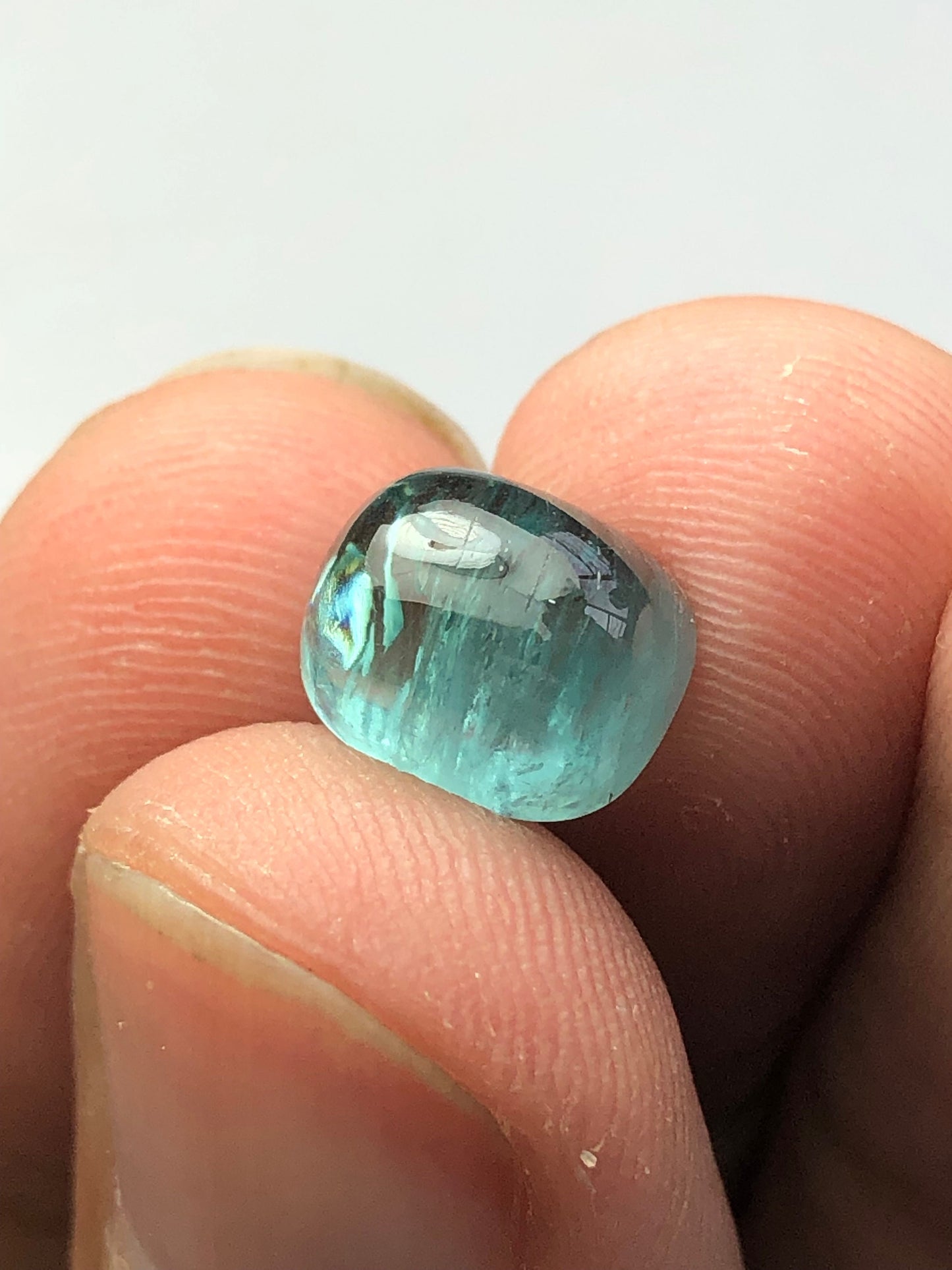 4 carat neon blue tourmaline cabochon