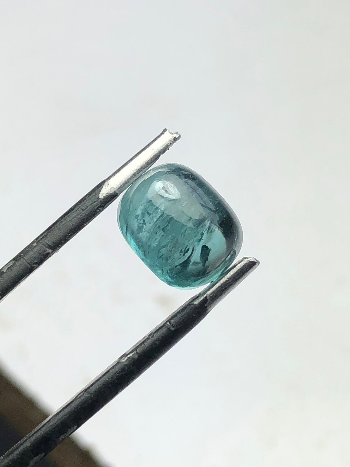 4 carat neon blue tourmaline cabochon