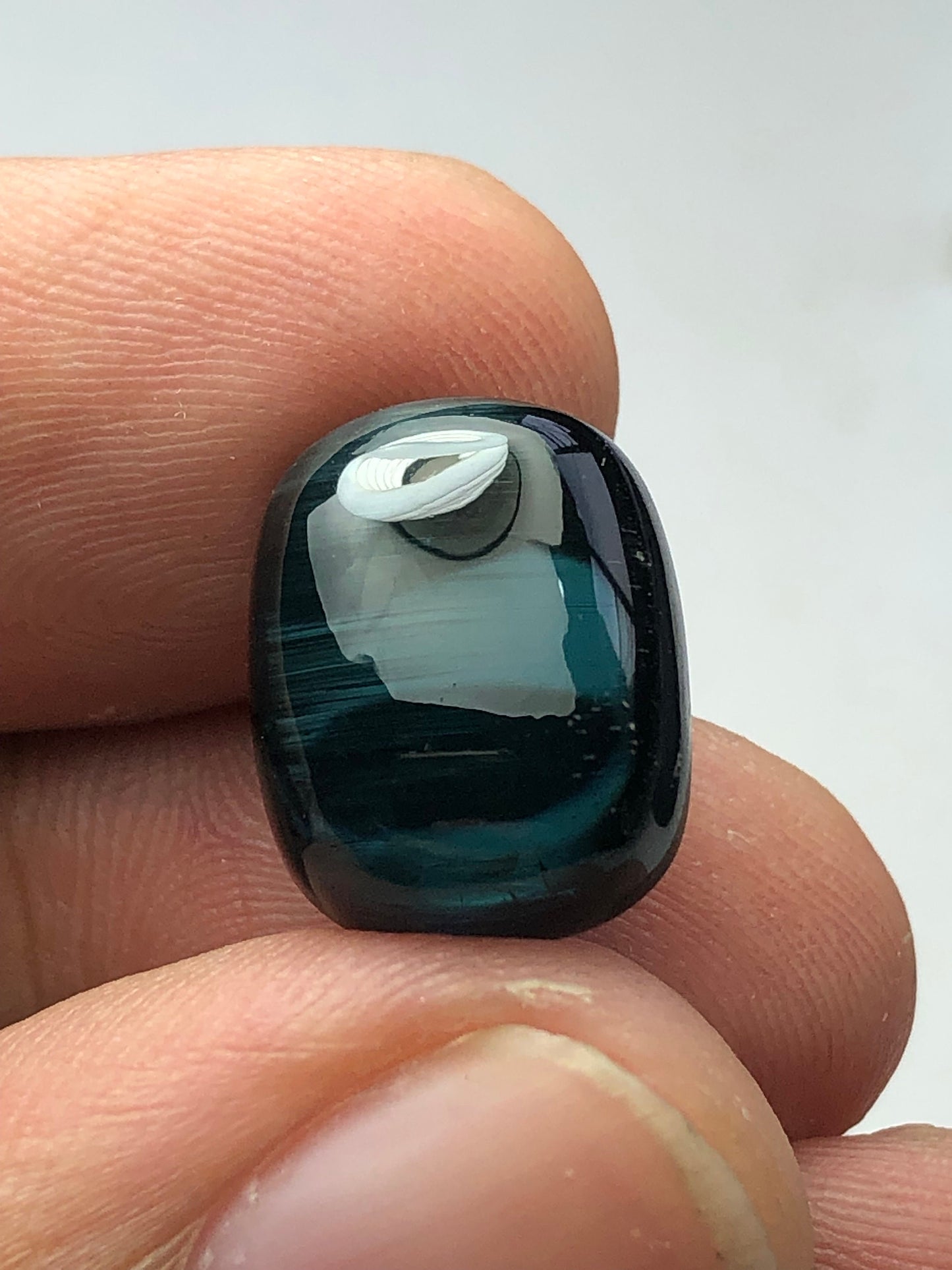 Dark blue tourmaline cabochon 10 carat