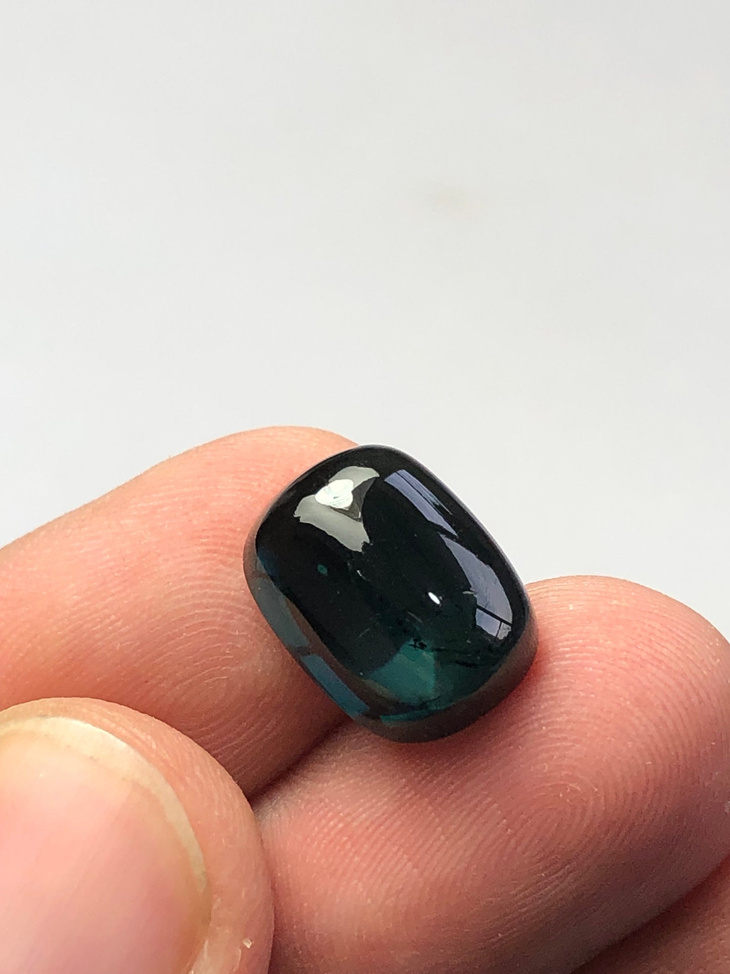 Dark blue tourmaline cabochon 8 carat