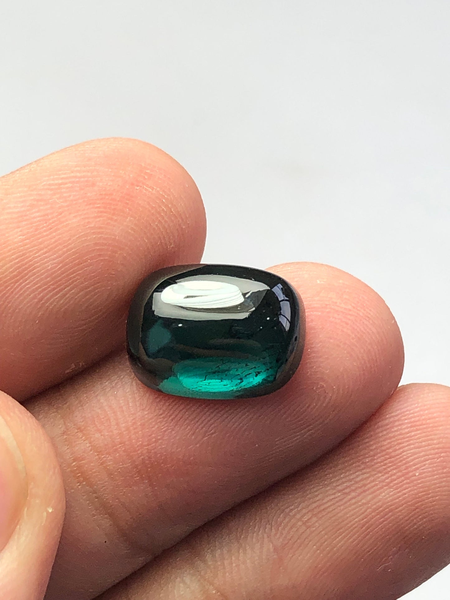 Dark blue tourmaline cabochon 8 carat