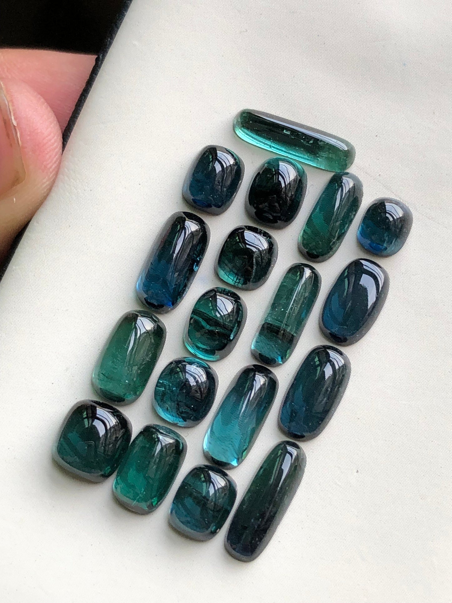 31 carats blue tourmaline cabochons origin Afghanistan 6mm to 13.5mm long