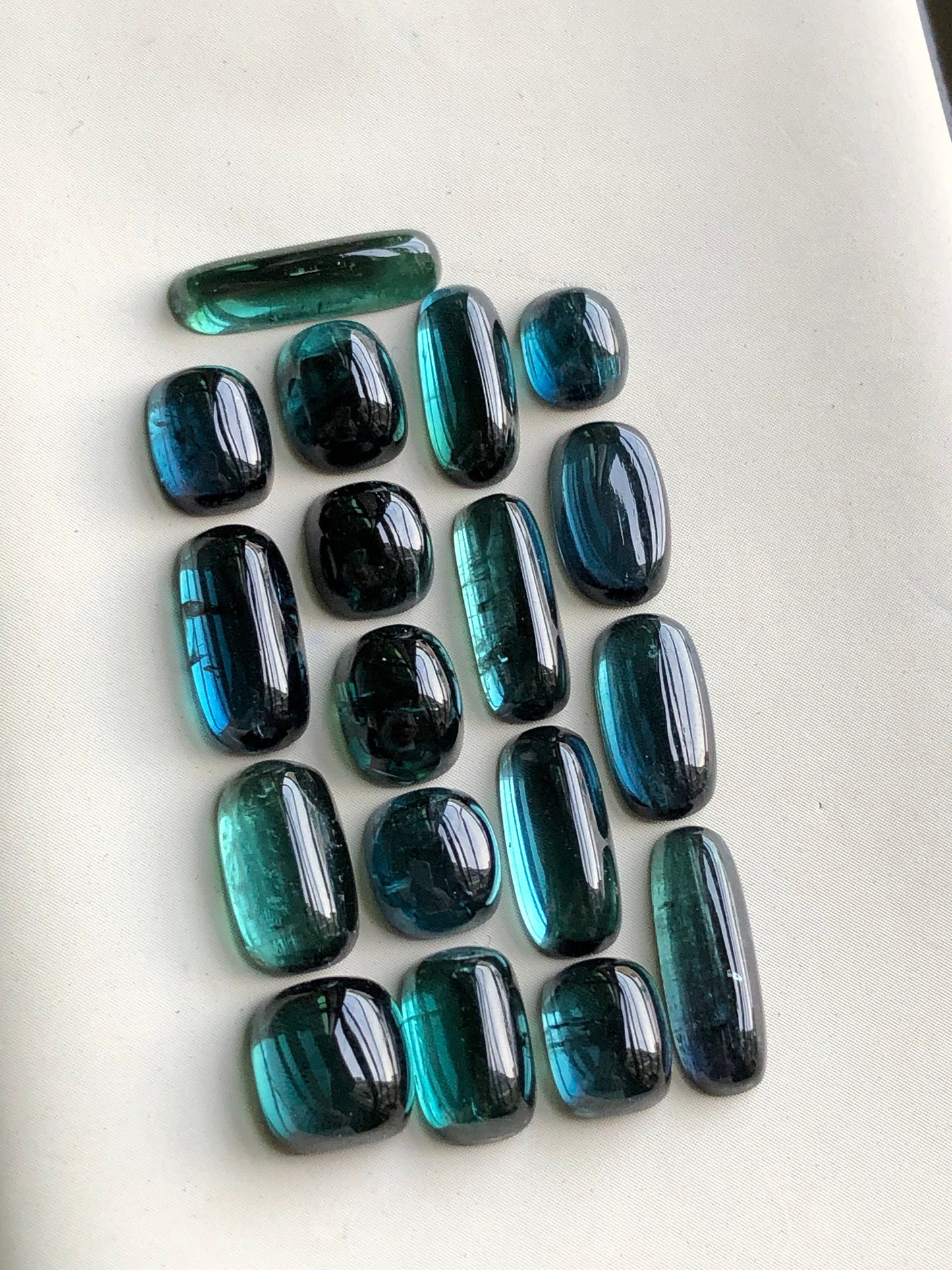 31 carats blue tourmaline cabochons origin Afghanistan 6mm to 13.5mm long