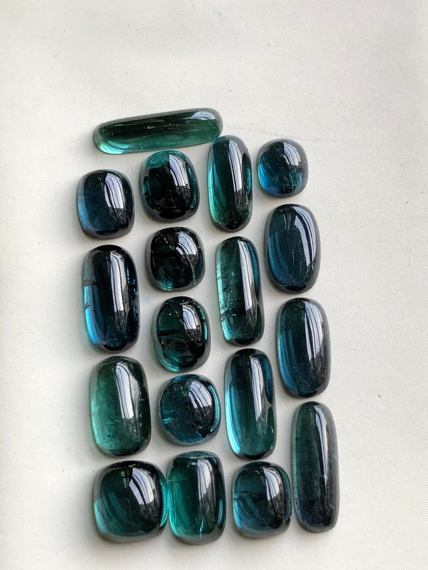 31 carats blue tourmaline cabochons origin Afghanistan 6mm to 13.5mm long