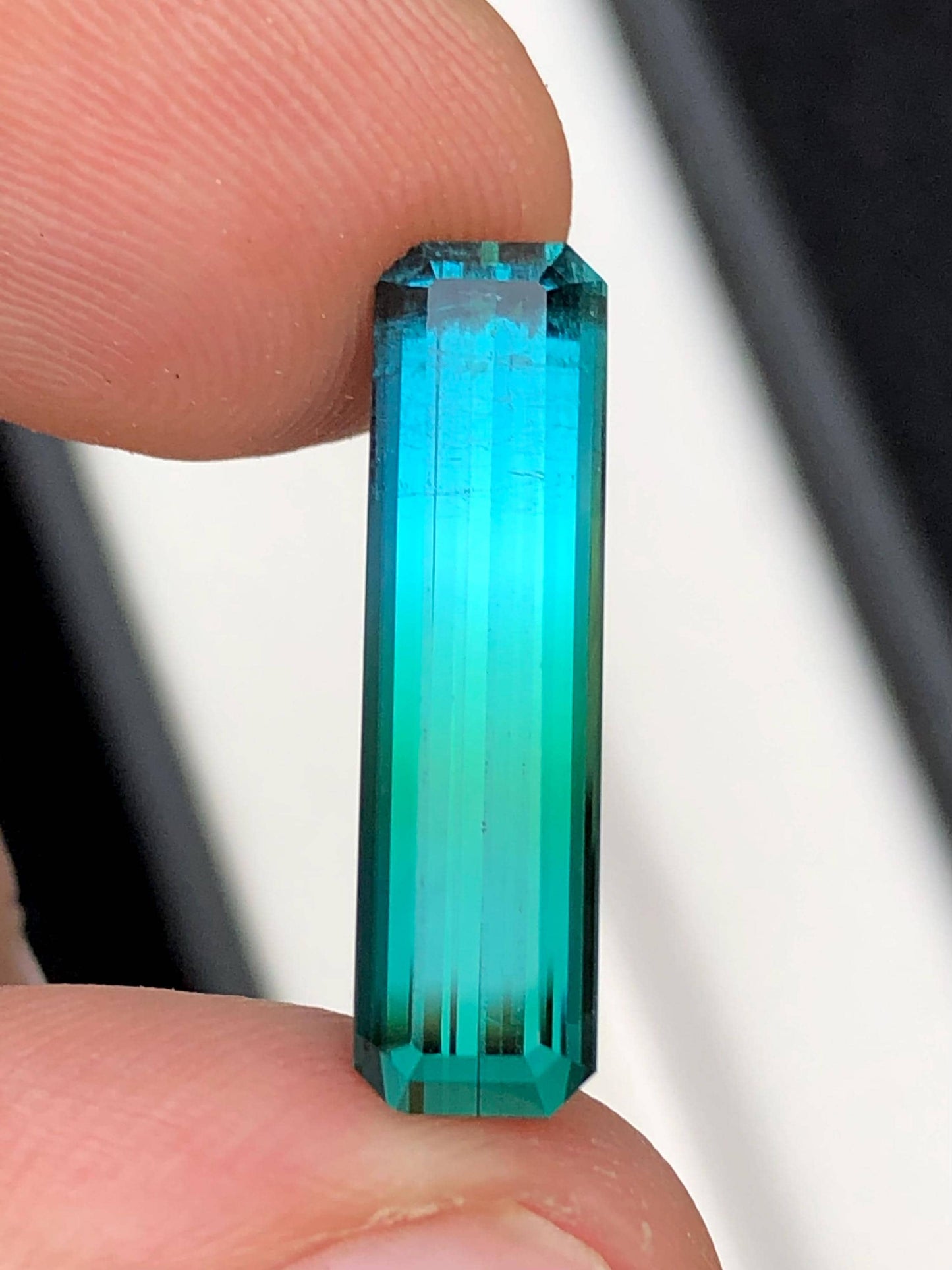 6.30 ct faceted bi colour tourmaline dimension:22*6*5mm