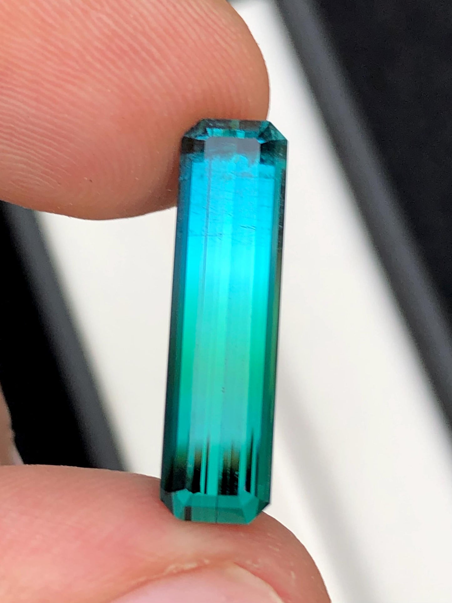 6.30 ct faceted bi colour tourmaline dimension:22*6*5mm