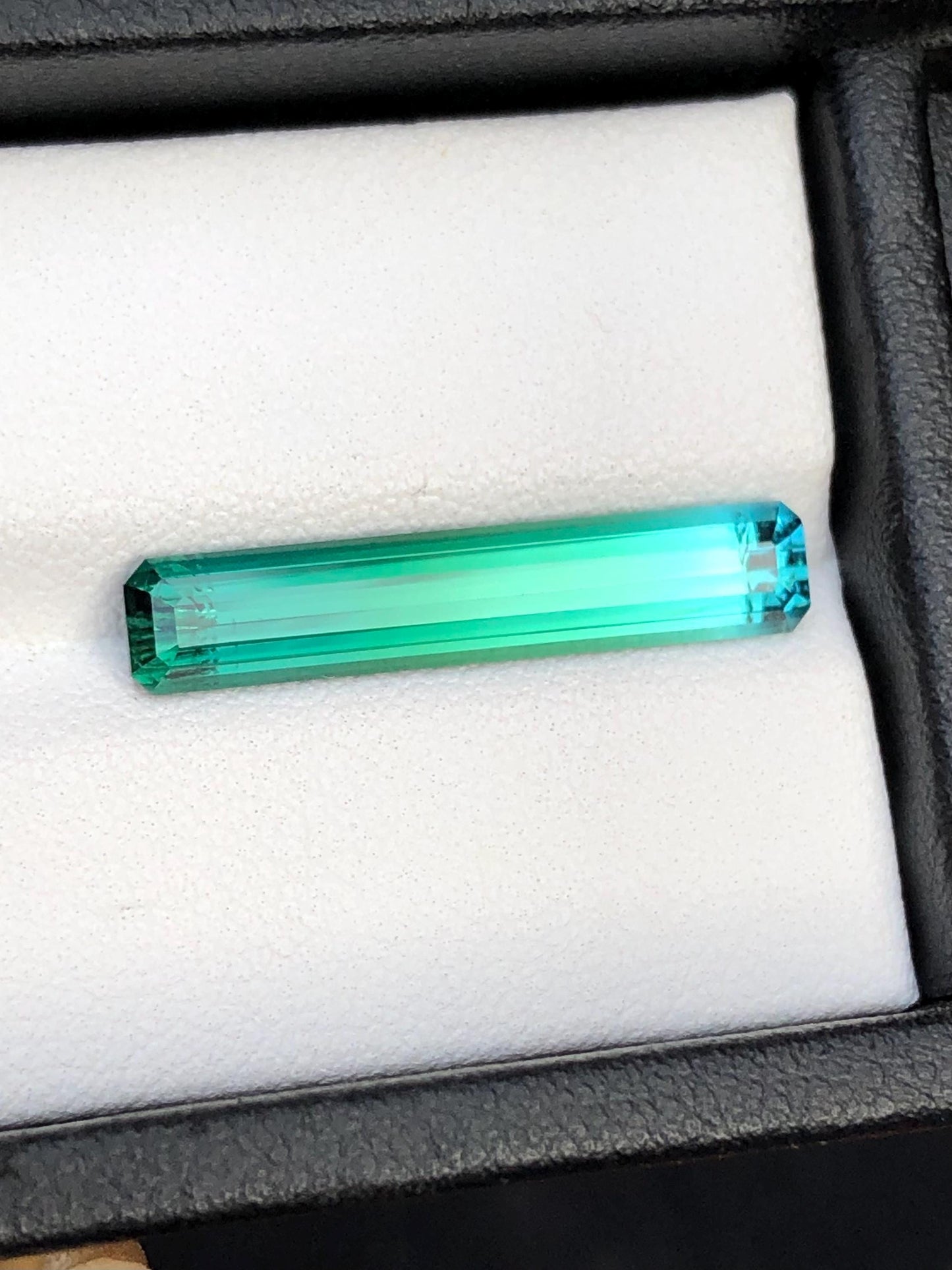 4.30 ct faceted Blue green tourmaline dimension:24*5*4mm