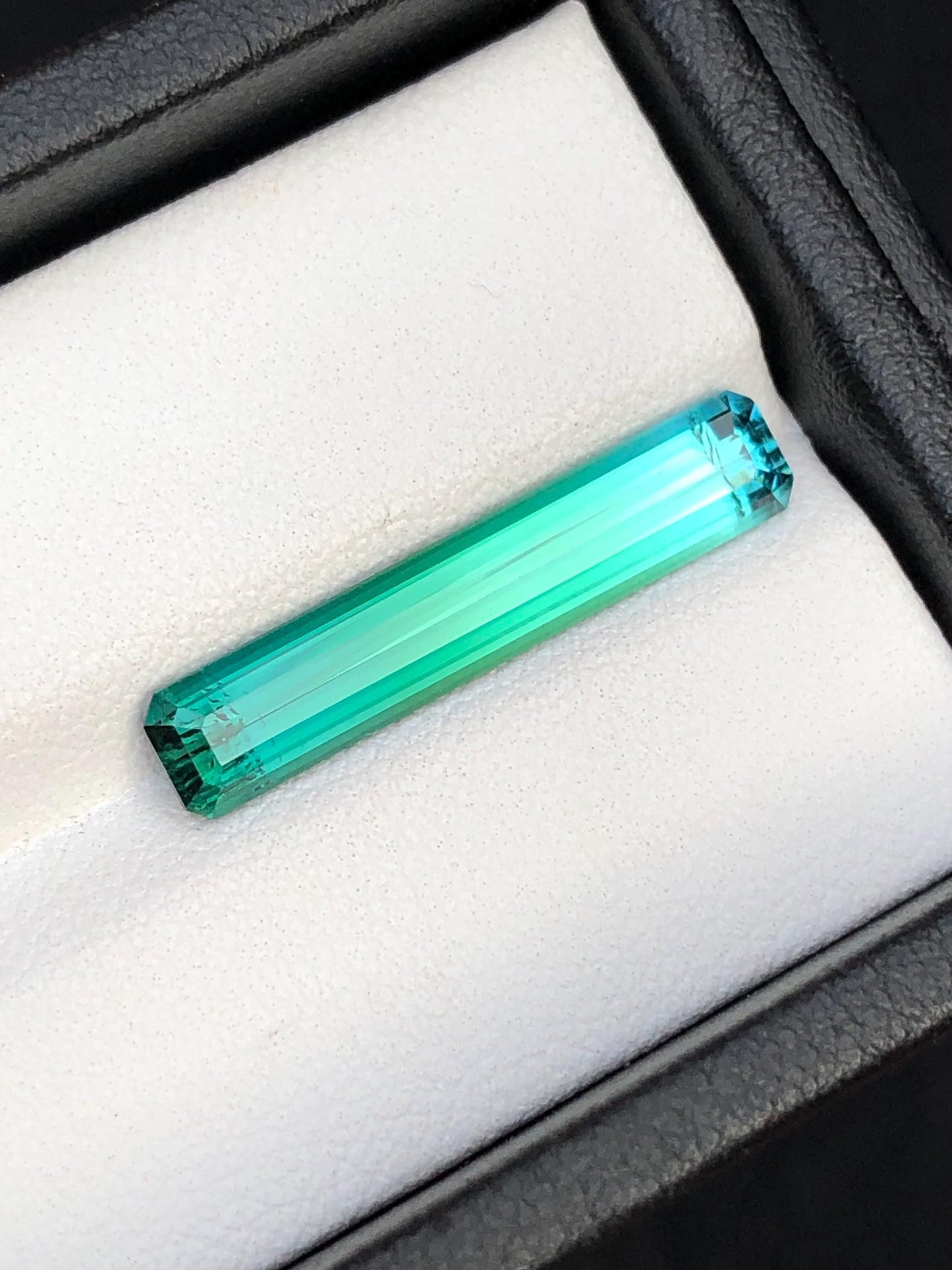 4.30 ct faceted Blue green tourmaline dimension:24*5*4mm