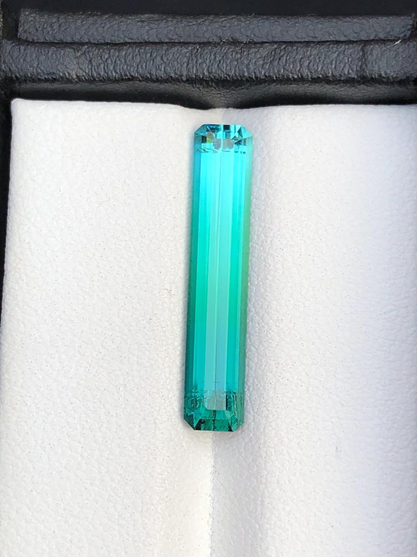 4.30 ct faceted Blue green tourmaline dimension:24*5*4mm