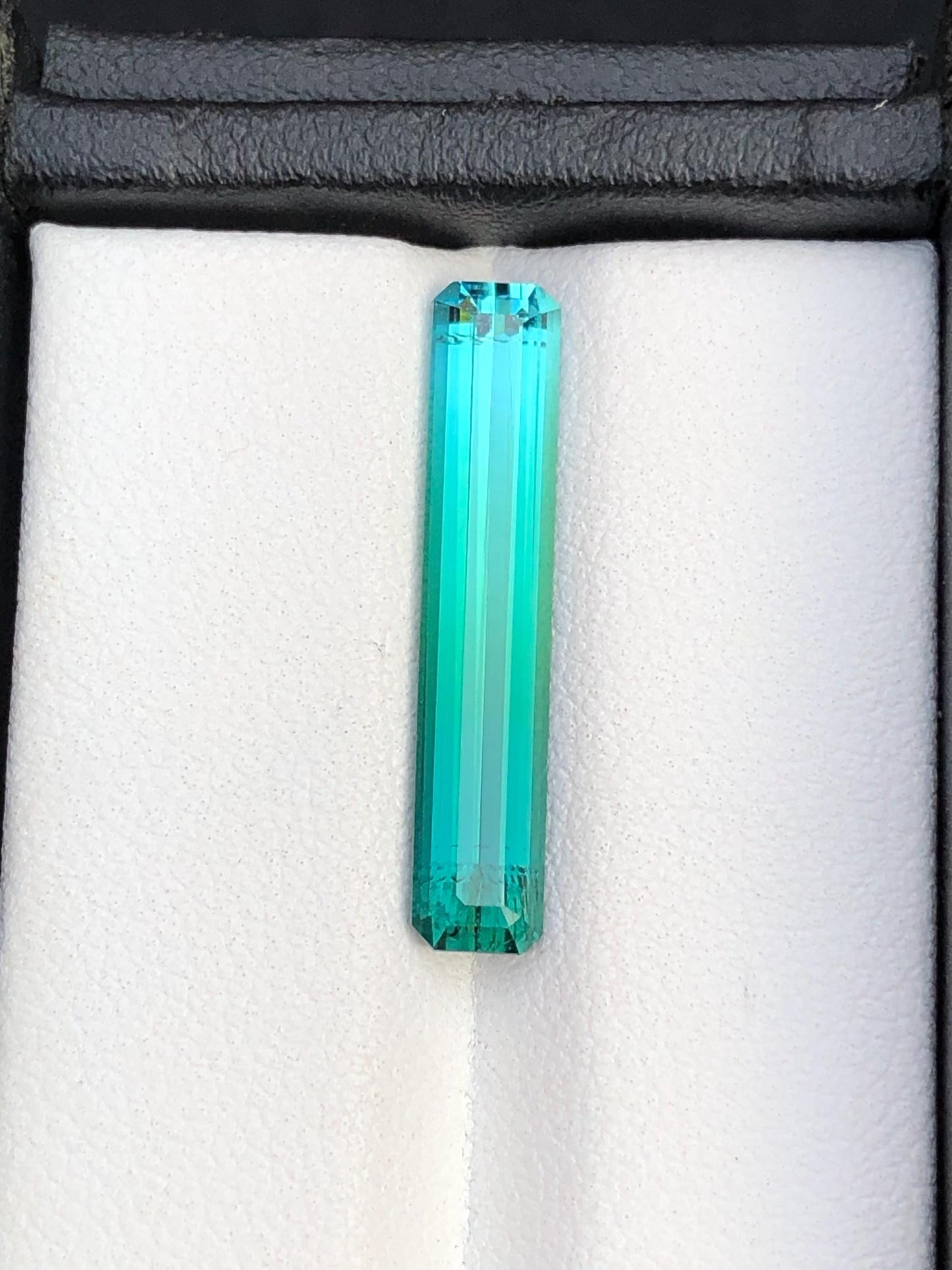 4.30 ct faceted Blue green tourmaline dimension:24*5*4mm