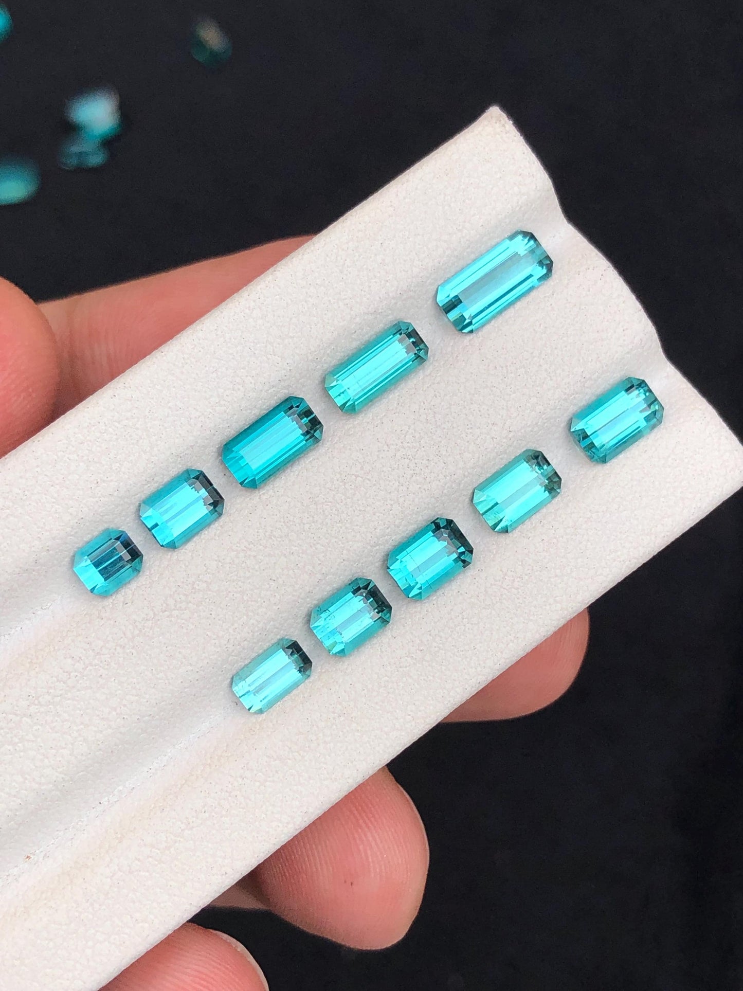 6.30 ct faceted neon blue tourmalines 4mm to 9mm