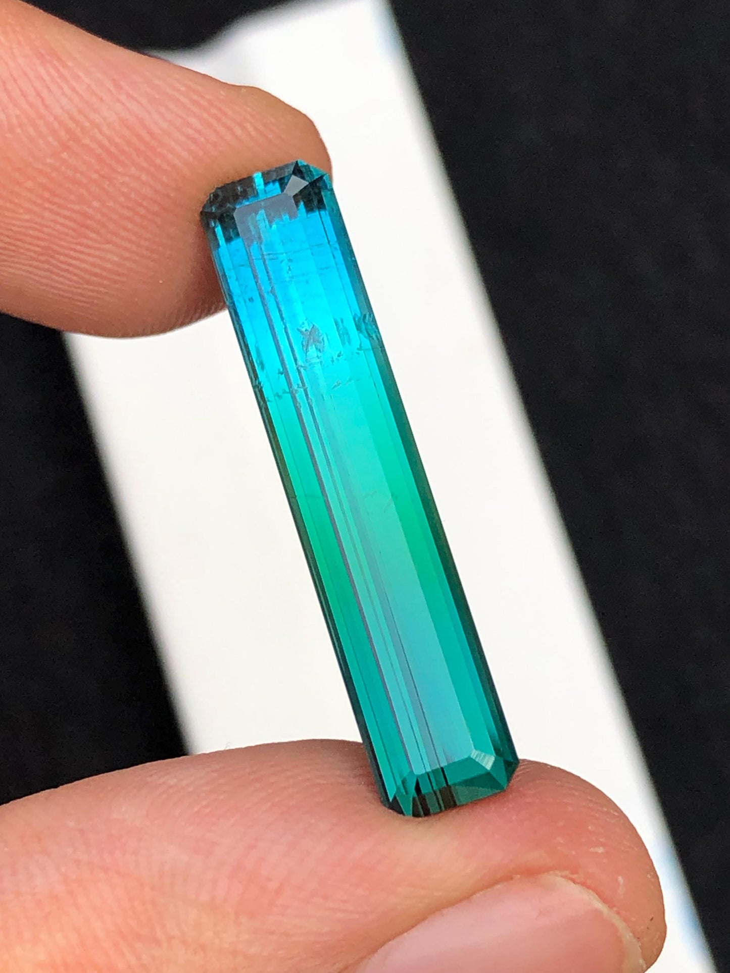 10.45 ct faceted bi colour tourmaline dimension:29*6*6mm