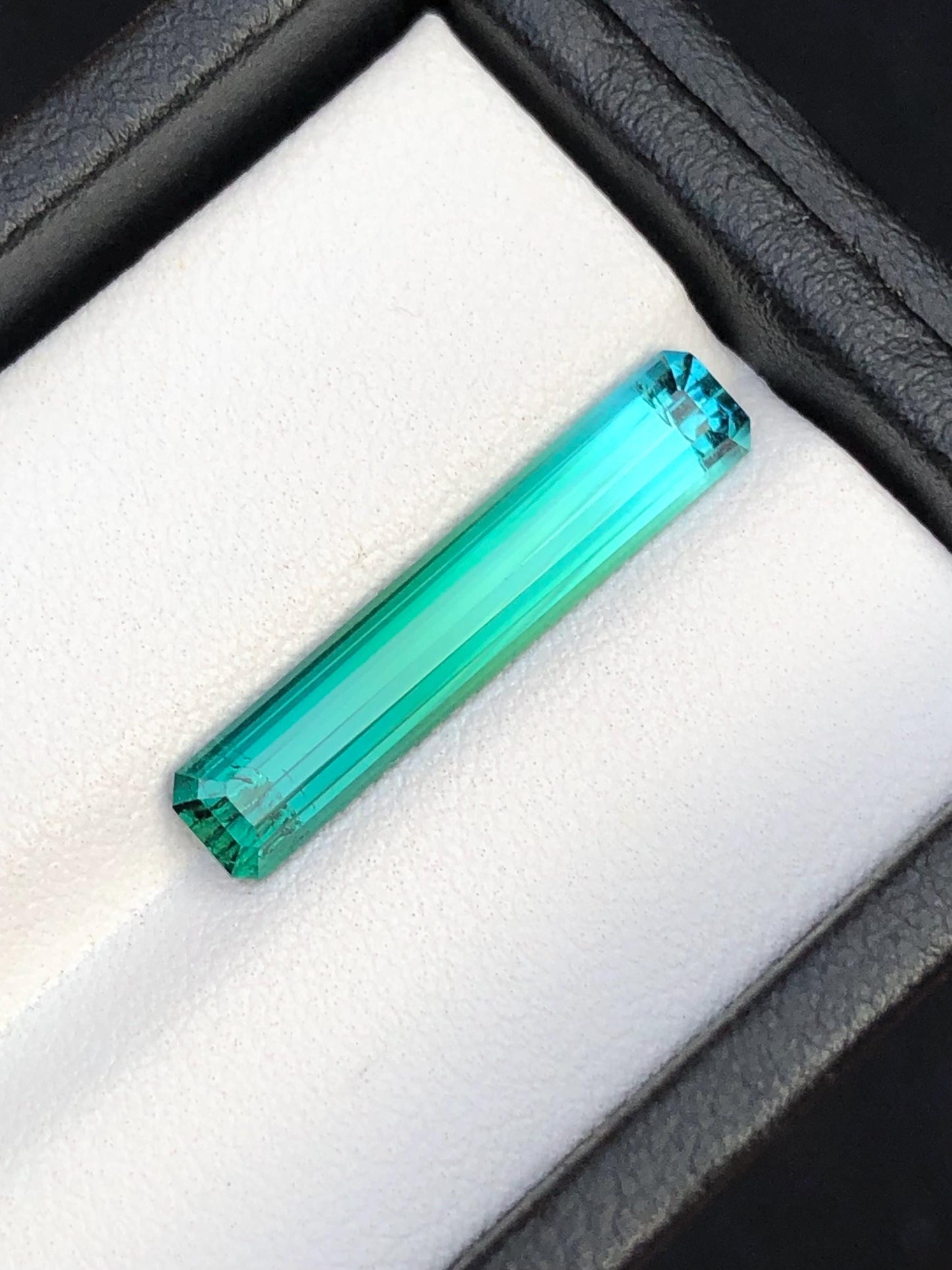 4.30 ct faceted Blue green tourmaline dimension:24*5*4mm