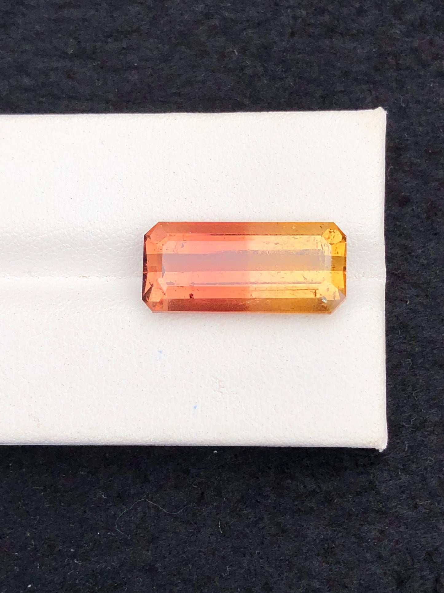 11.40 ct faceted unique bi colour tourmaline dimension:20*9*7mm