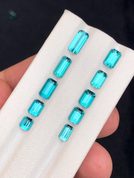 6.30 ct faceted neon blue tourmalines 4mm to 9mm